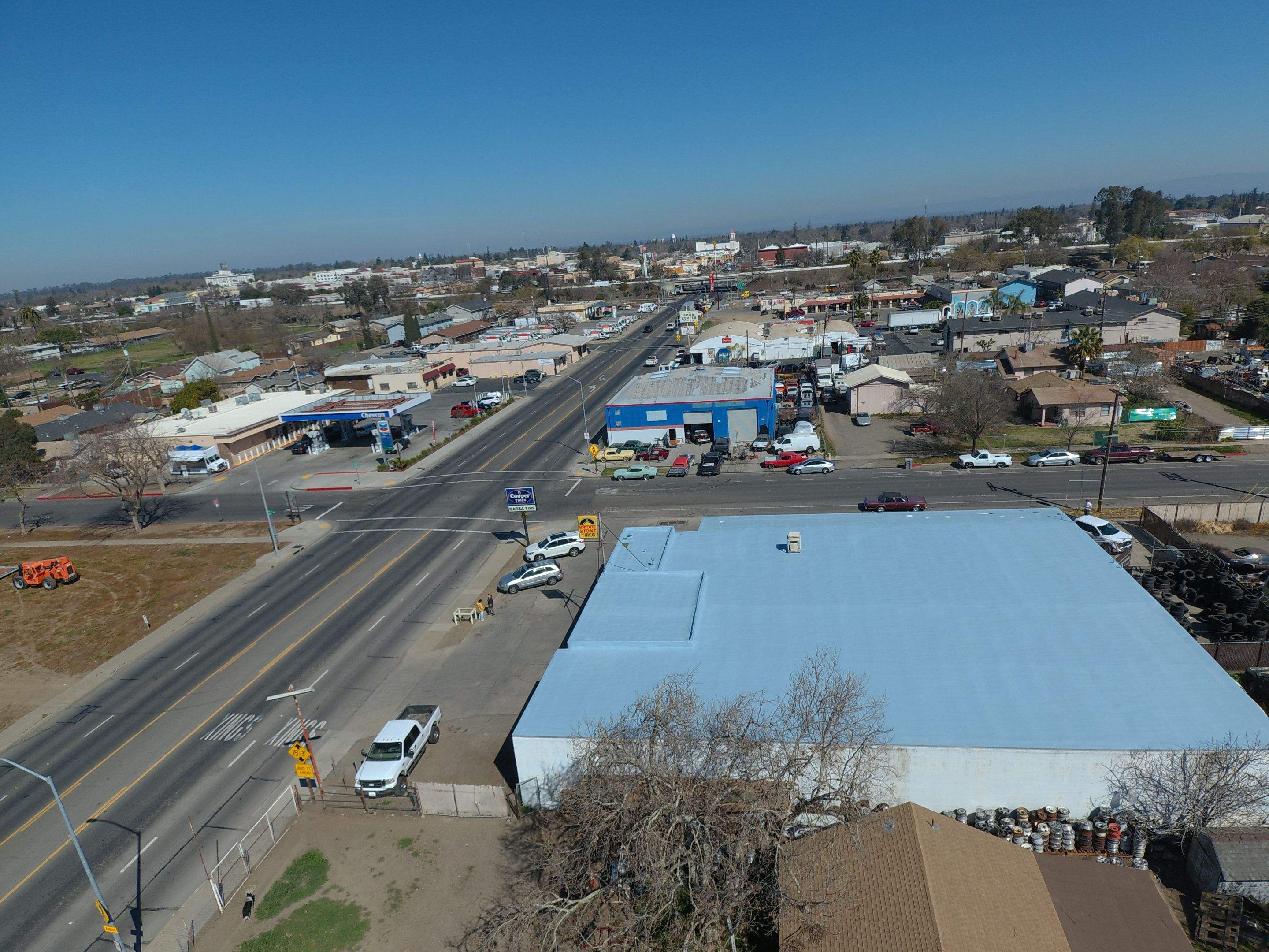 Spray foam and coatings using Conklin Benchmark/PUMA XL coatings and spray foam by Straight Edge Roofing Inc