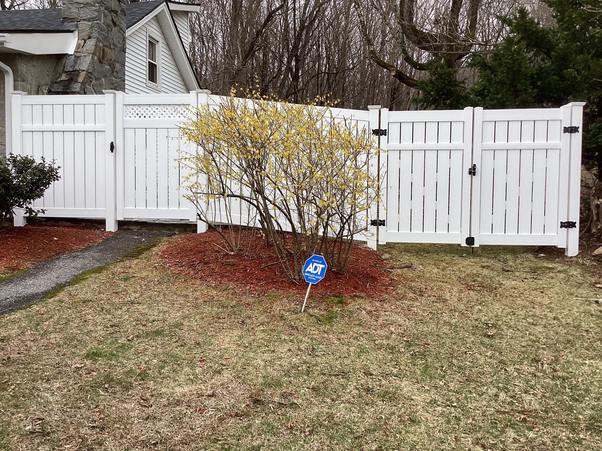 New White Semi privacy Vinyl Fence and matching gates by DiGiorgi Roofing and Siding Inc