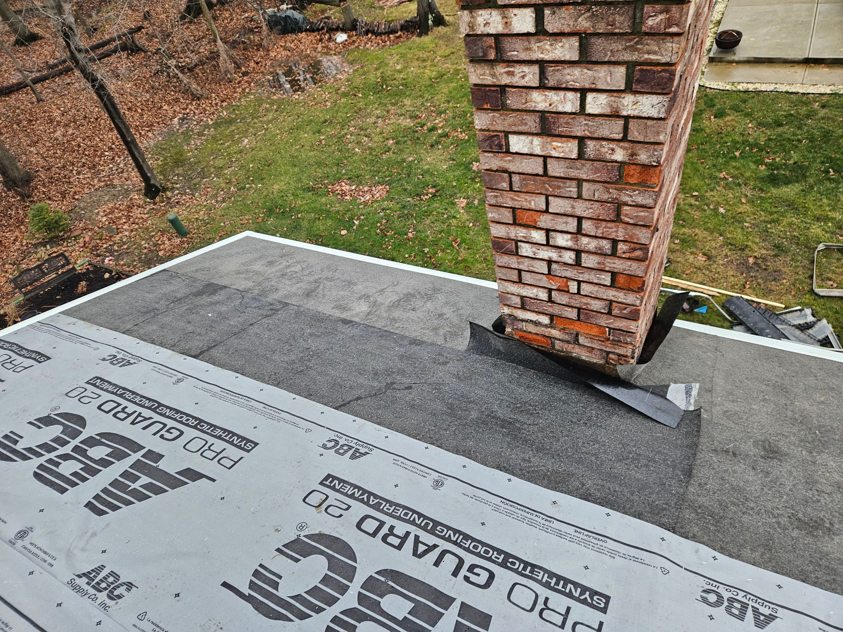 Residential Roof Replacement using Owens Corning Onyx Black by Absolute Roofing and Construction
