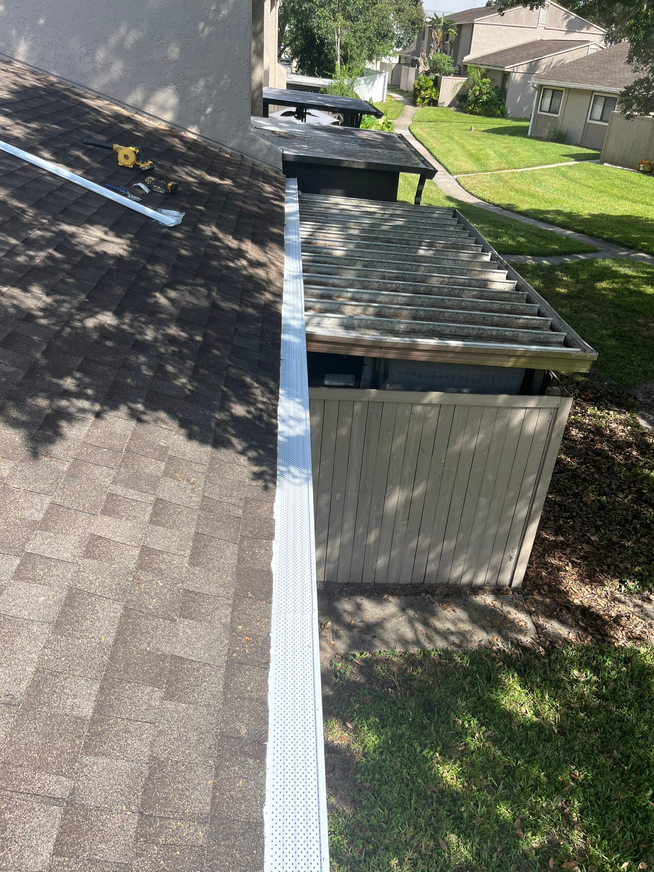 Professional Downspout Installation in Tampa, FL by Gutter Professor by Gutter Professors