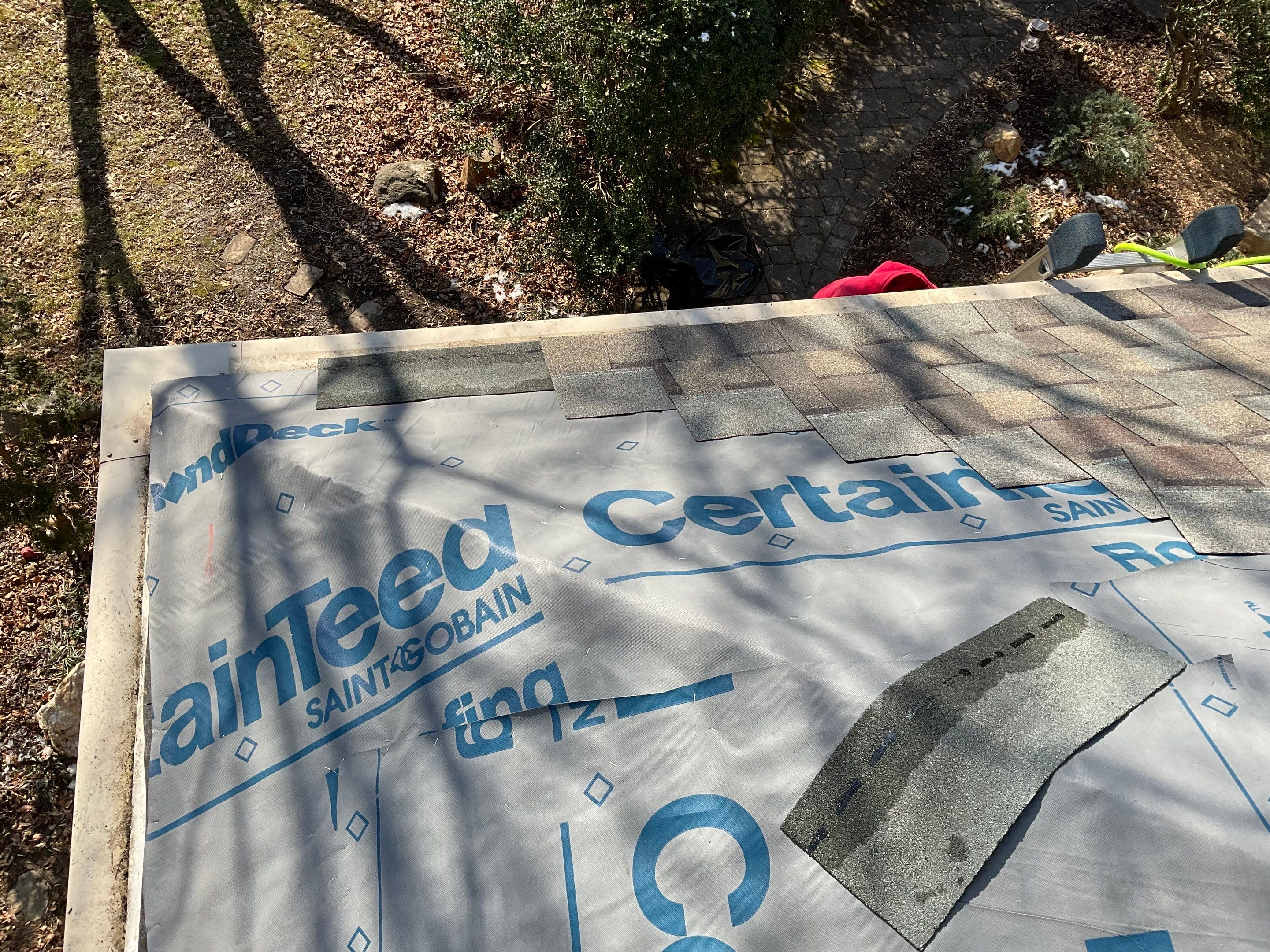Install new shingles and new skylights  by Alpha Design Services