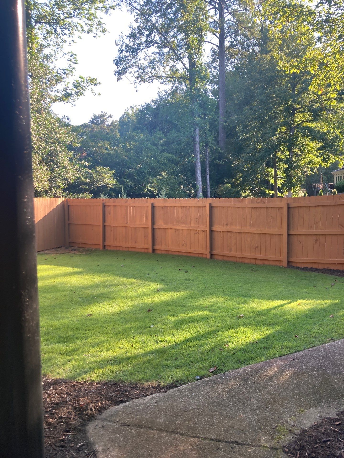 Deck and Fence Stain with Deck Board Repairs in Atlanta, GA by Nelson Exteriors 