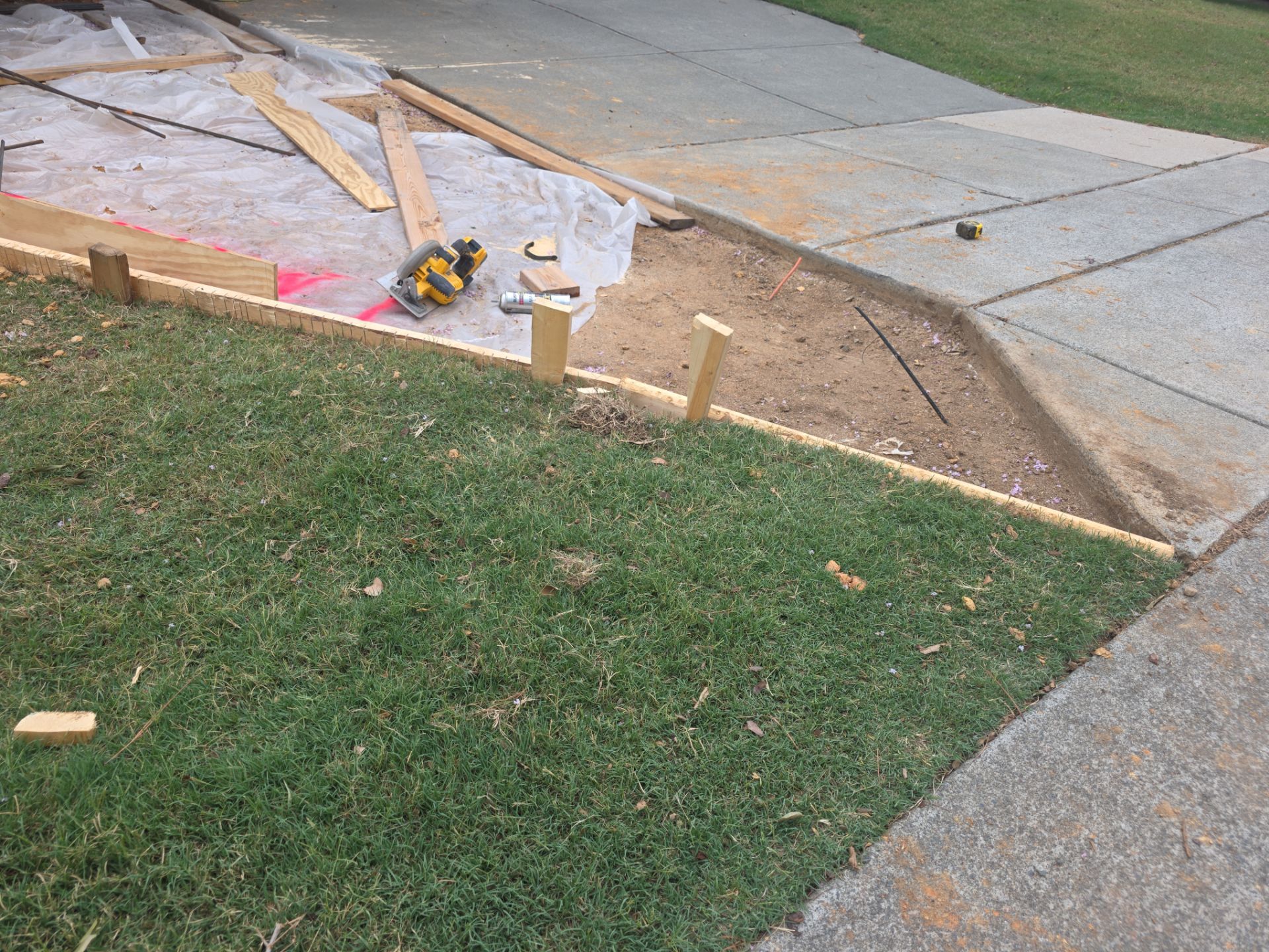 Concrete Driveway Expansion & Retaining Wall | Apex, NC by Elite Remodeling and Design LLC