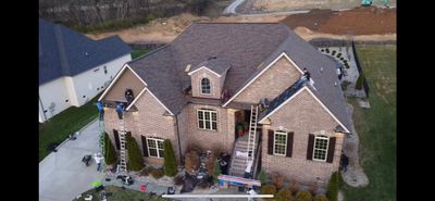 Roof replacement paid for by USAA - Duration shingles in Teak