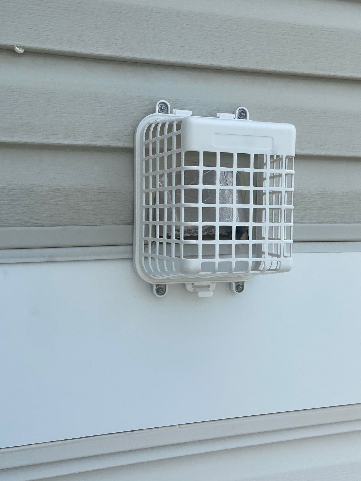 Dryer vent guard installation  by Storm Ready Exteriors