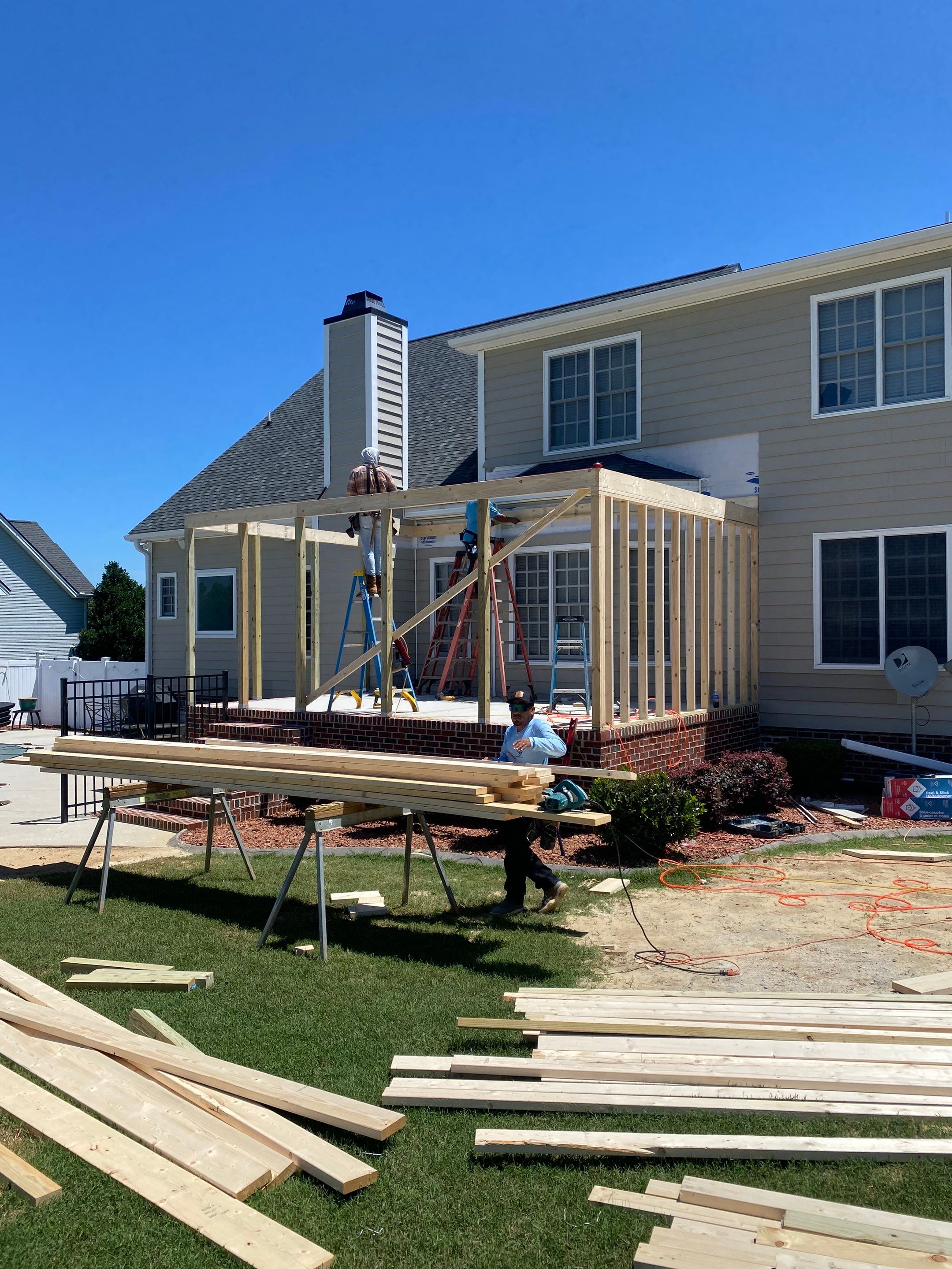 Custom Screened Porch and Concrete Walkway Installation in Rocky Mount by The Remodeling Company