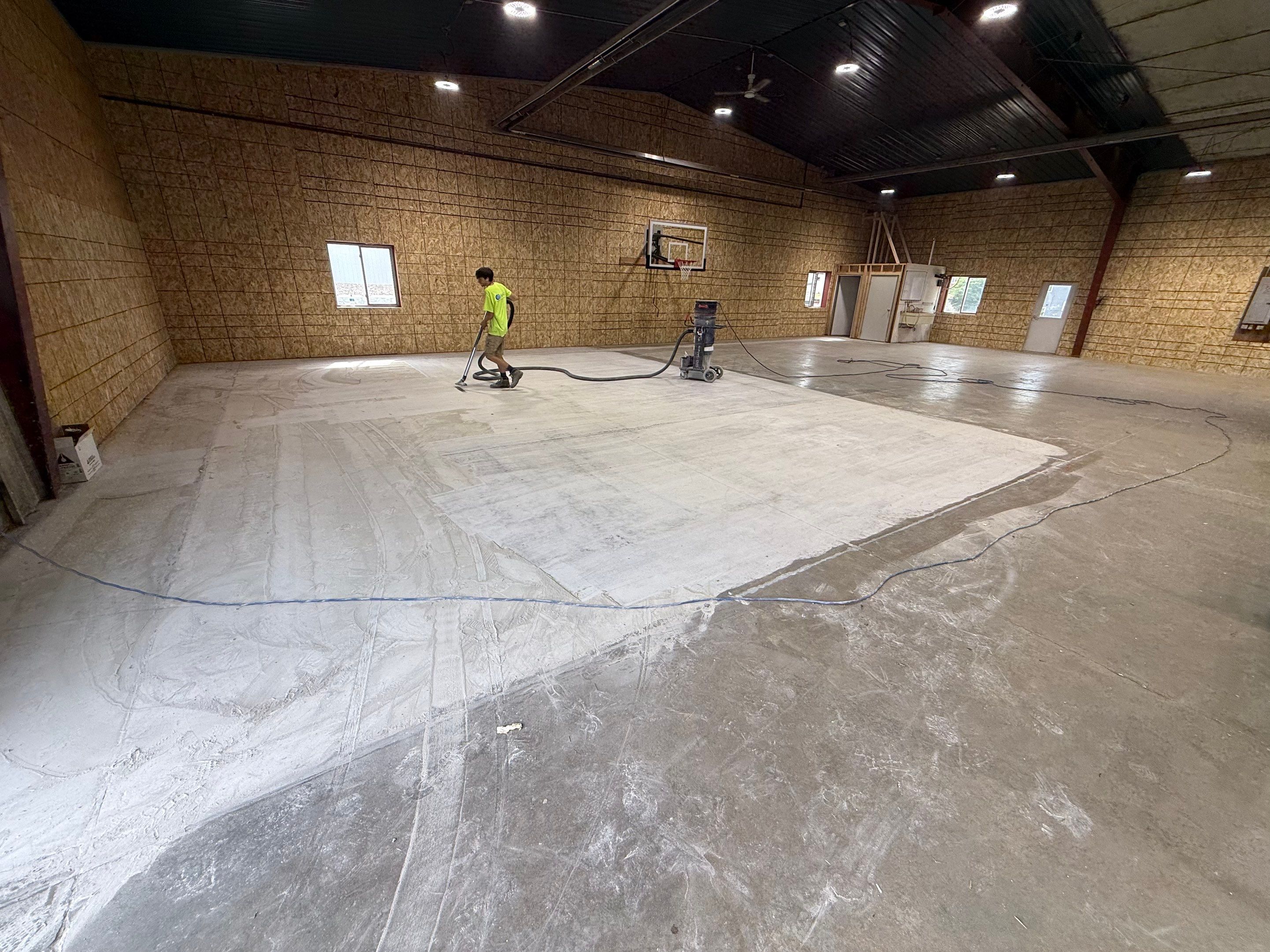 Custom Polyurea Shop Floor with Basketball Court Lines in Rock Valley by Select Painting, Coatings & Garage Cabinets