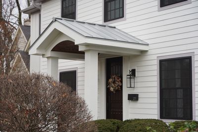 Exterior Renovation in Elmhurst with James Hardie Siding and Windows