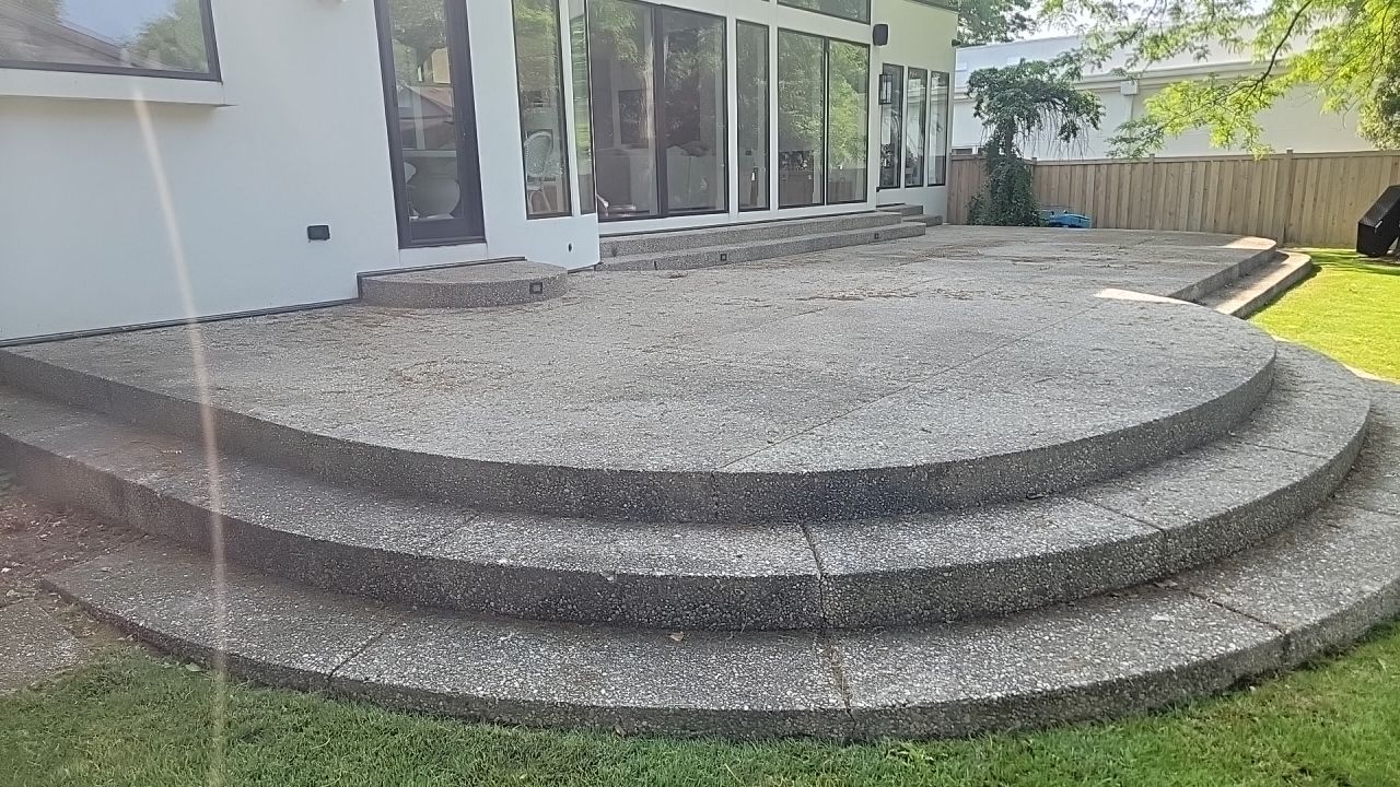 Aggregate concrete cleaning and sealing using Surebond SB-9000 by Northern Power Washing LLC.