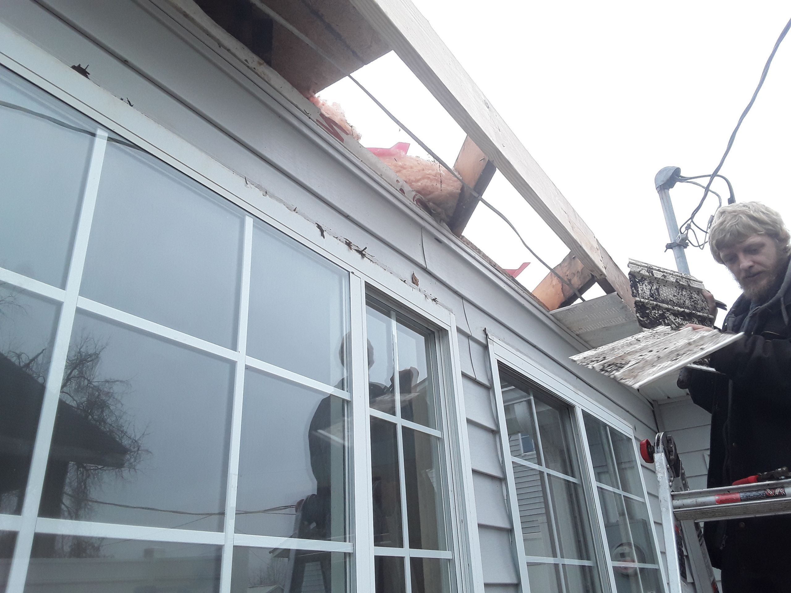 Rubber Roofing  on a residential sunroom by Secure Construction Company Inc