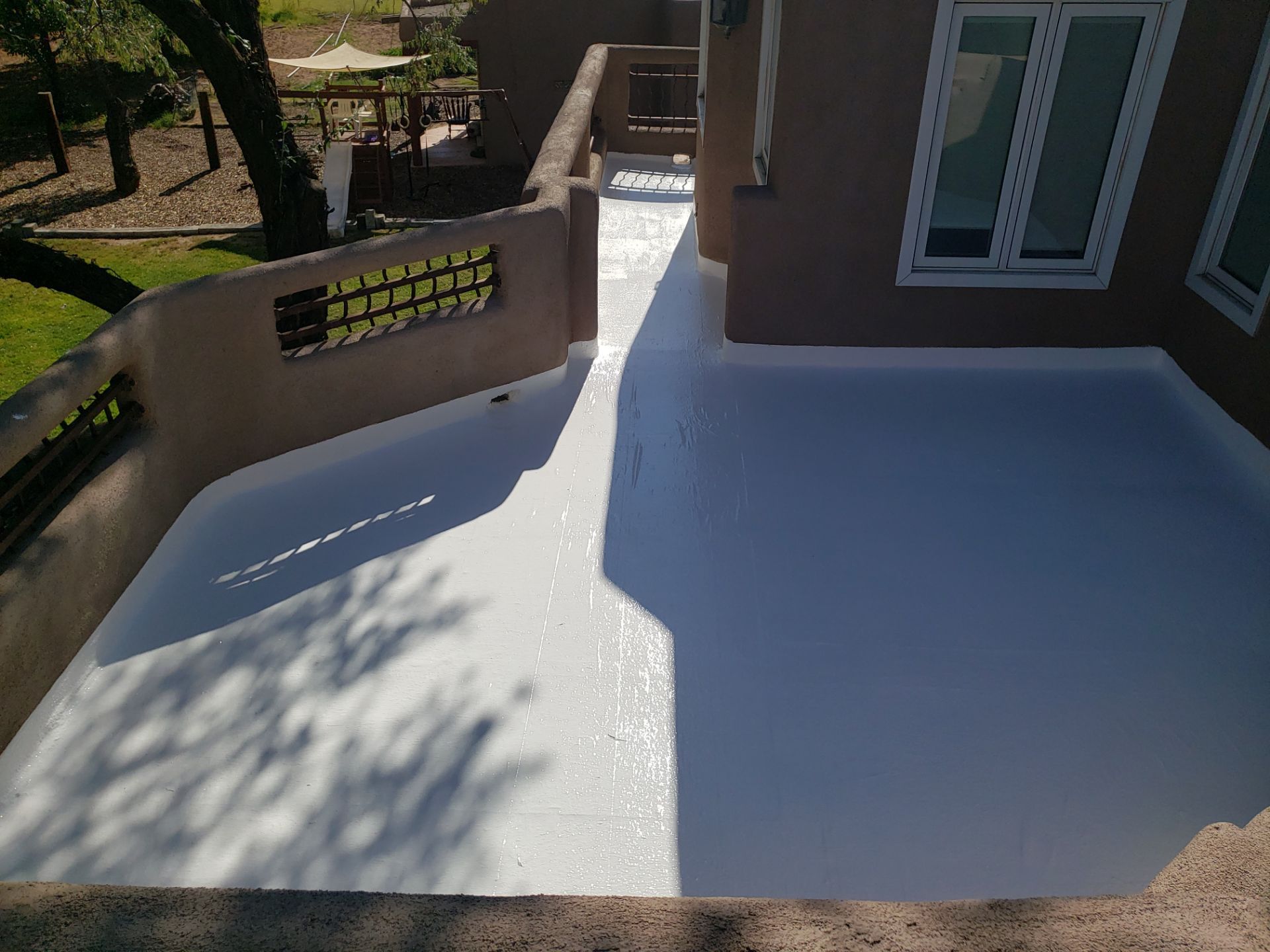 Residential roof application by SPF Services 