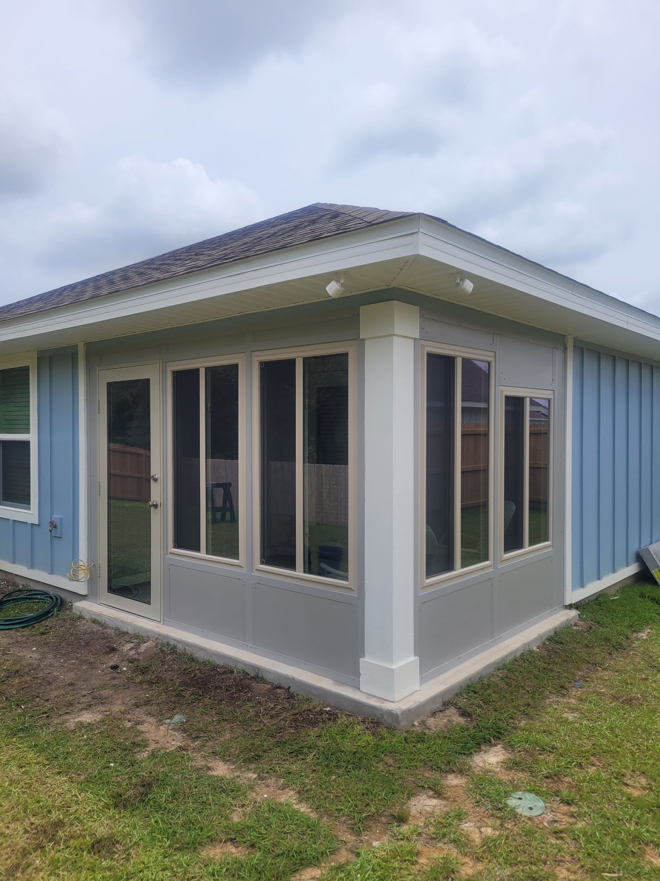 Screen Under Glass Room in Crestview by Titan Sunrooms