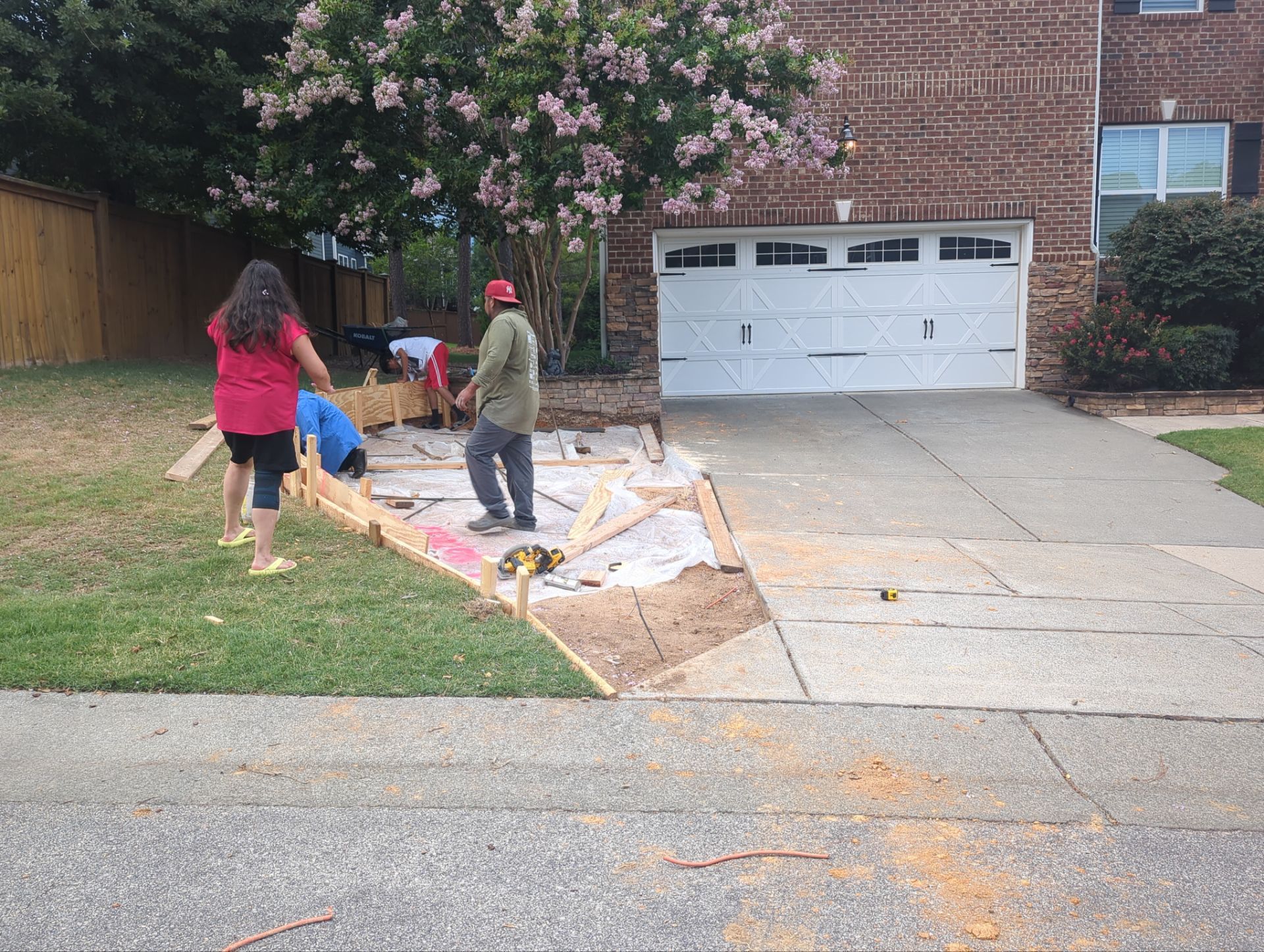 Concrete Driveway Expansion & Retaining Wall | Apex, NC by Elite Remodeling and Design LLC