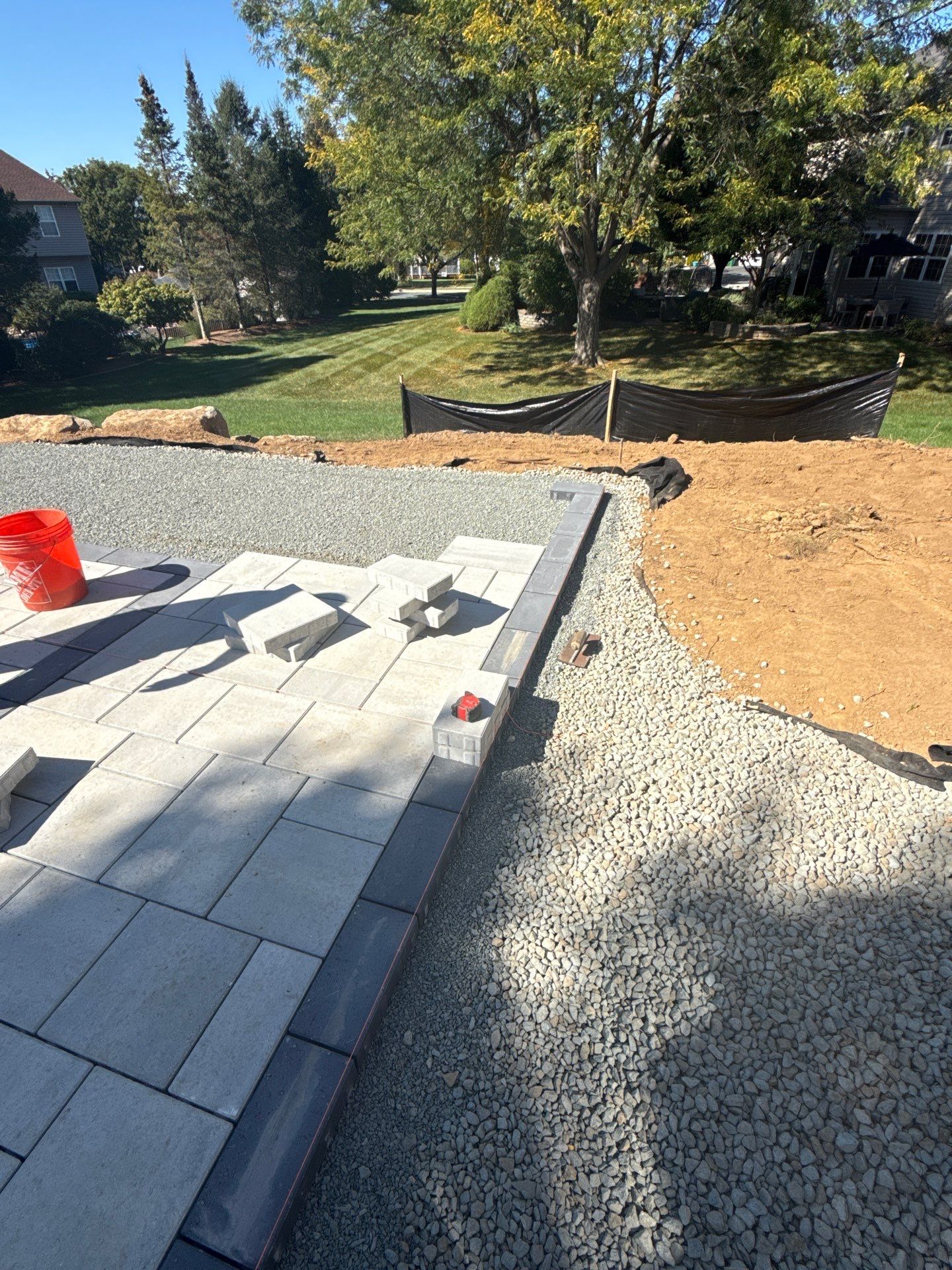 Backyard Retreat: Techo-Bloc Patio + Firepit Lounge by Saylor’s Lawn & Landscape