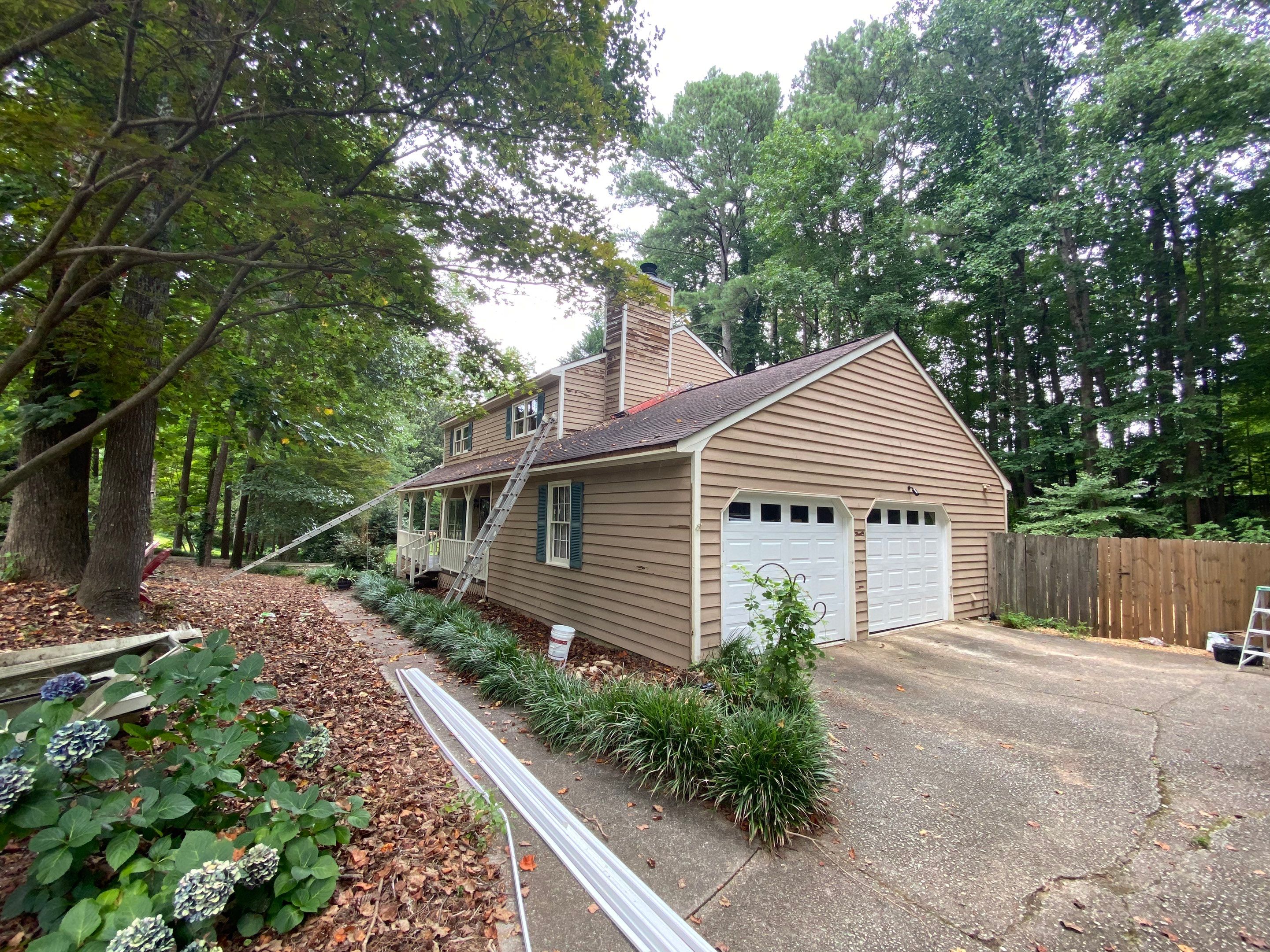 Mableton Exterior Painting and Pressure Treated Wood Deck Installation by Swift Home Renovations