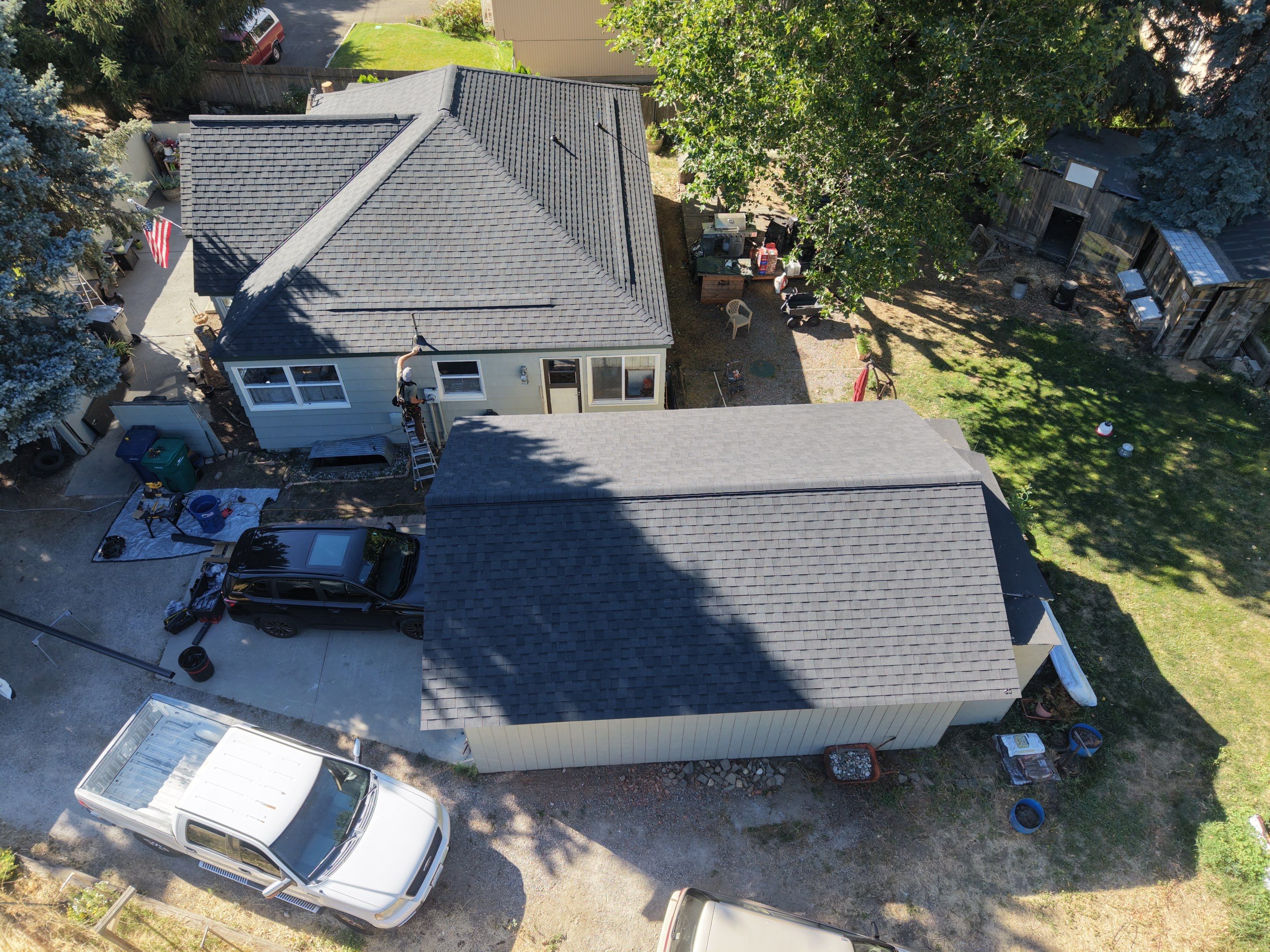 Residential Asphalt Shingle Roof Replacement for Home and Garage in Wenatchee by Alpine Roofing