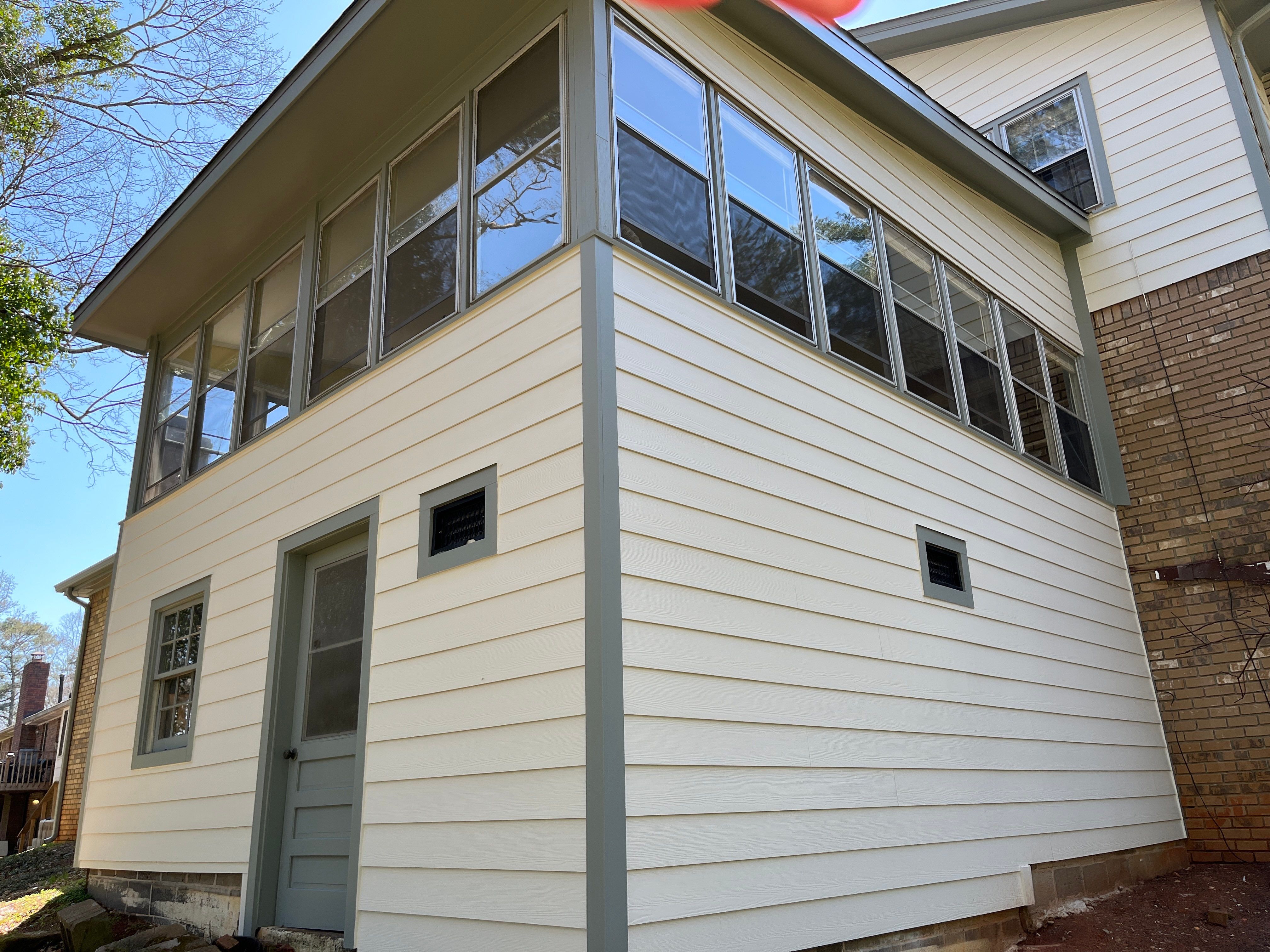 Board and Batten Siding Installation and Railing Replacement in Lilburn, GA by Nelson Exteriors 