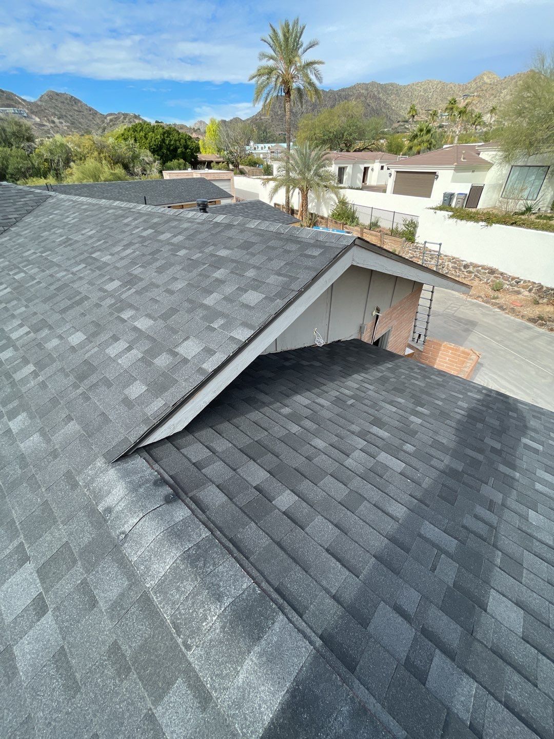 Onyx Black Shingles by Reimagine Roofing