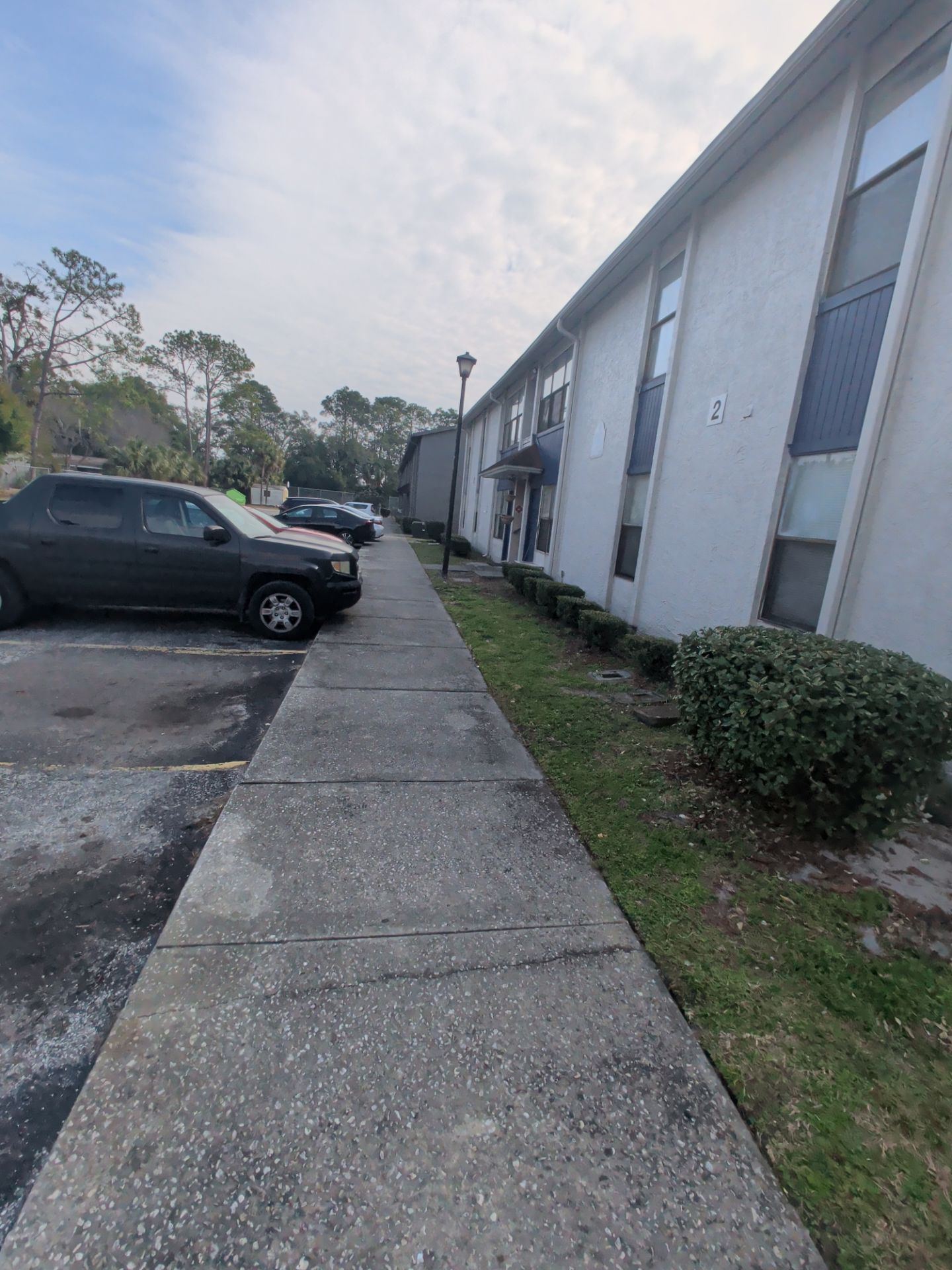 Commercial Landscape Cleanup & Weekly Maintenance — Grassy Pond Apartments by Harmoni Home Services