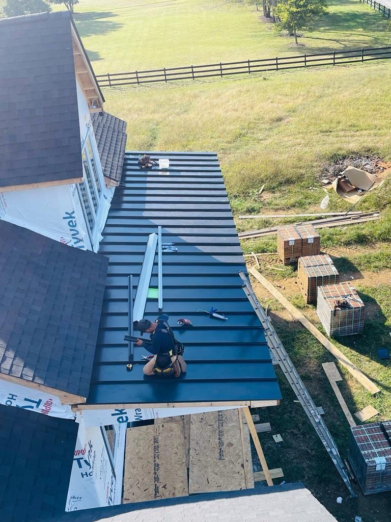 Residential Roofing Installation using Tamko Heritage AR with Standing Seam Metal Porch by Undersun Roofing 