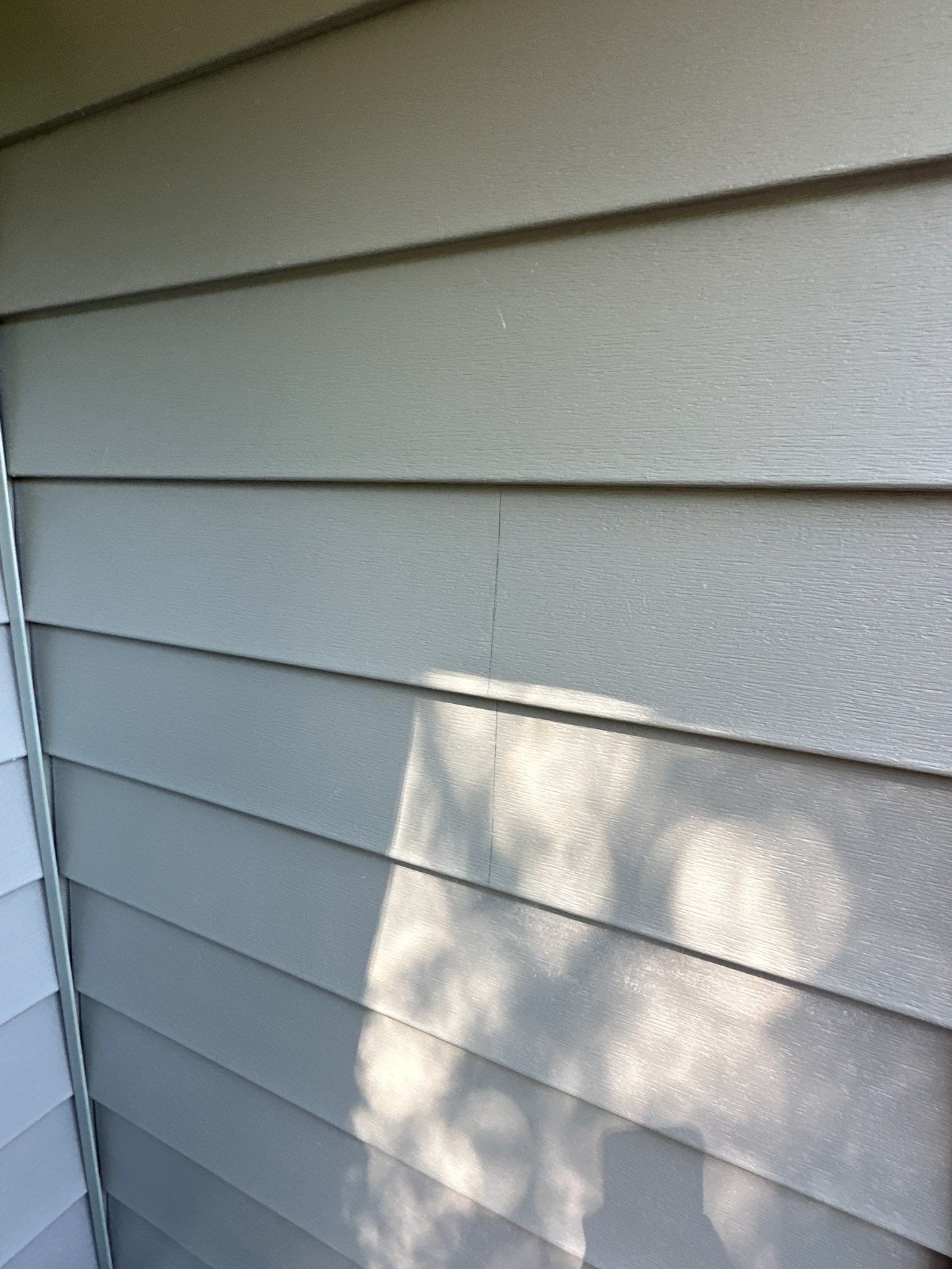 New Craneboard Siding on this Platte City, Mo home  by EEC  Windows, Siding & Roofing 