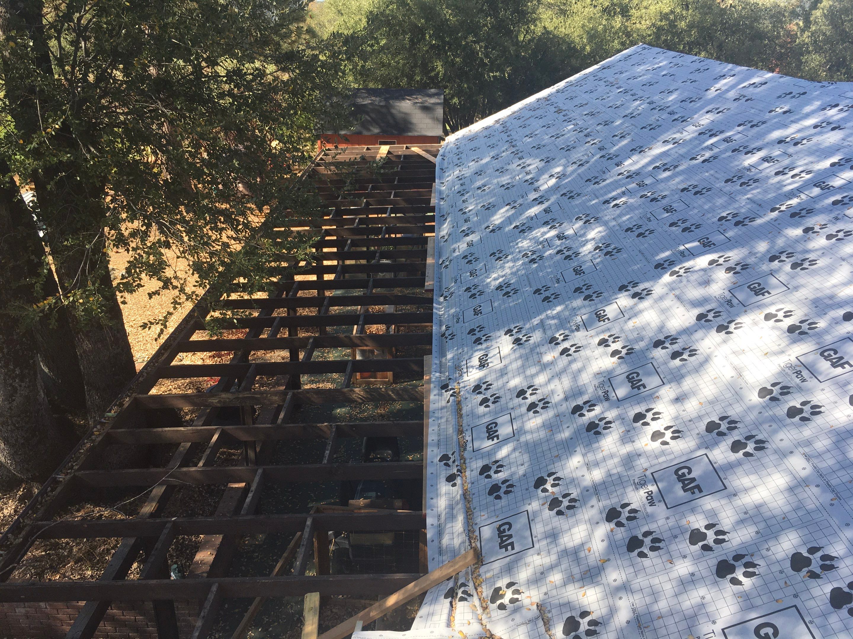 Metal roofing installation using Standing seam metal roofing system by Straight Edge Roofing Inc