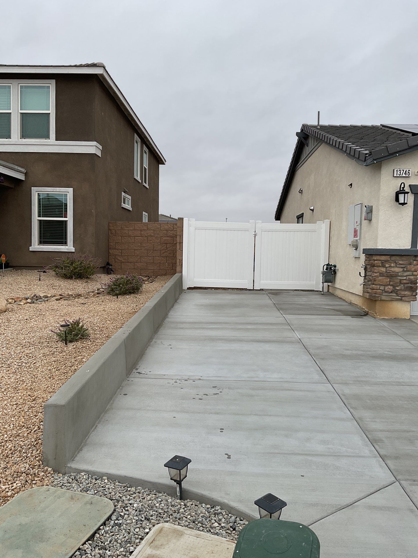 Gate installation using Vinyl by Fence Guys Inc. 