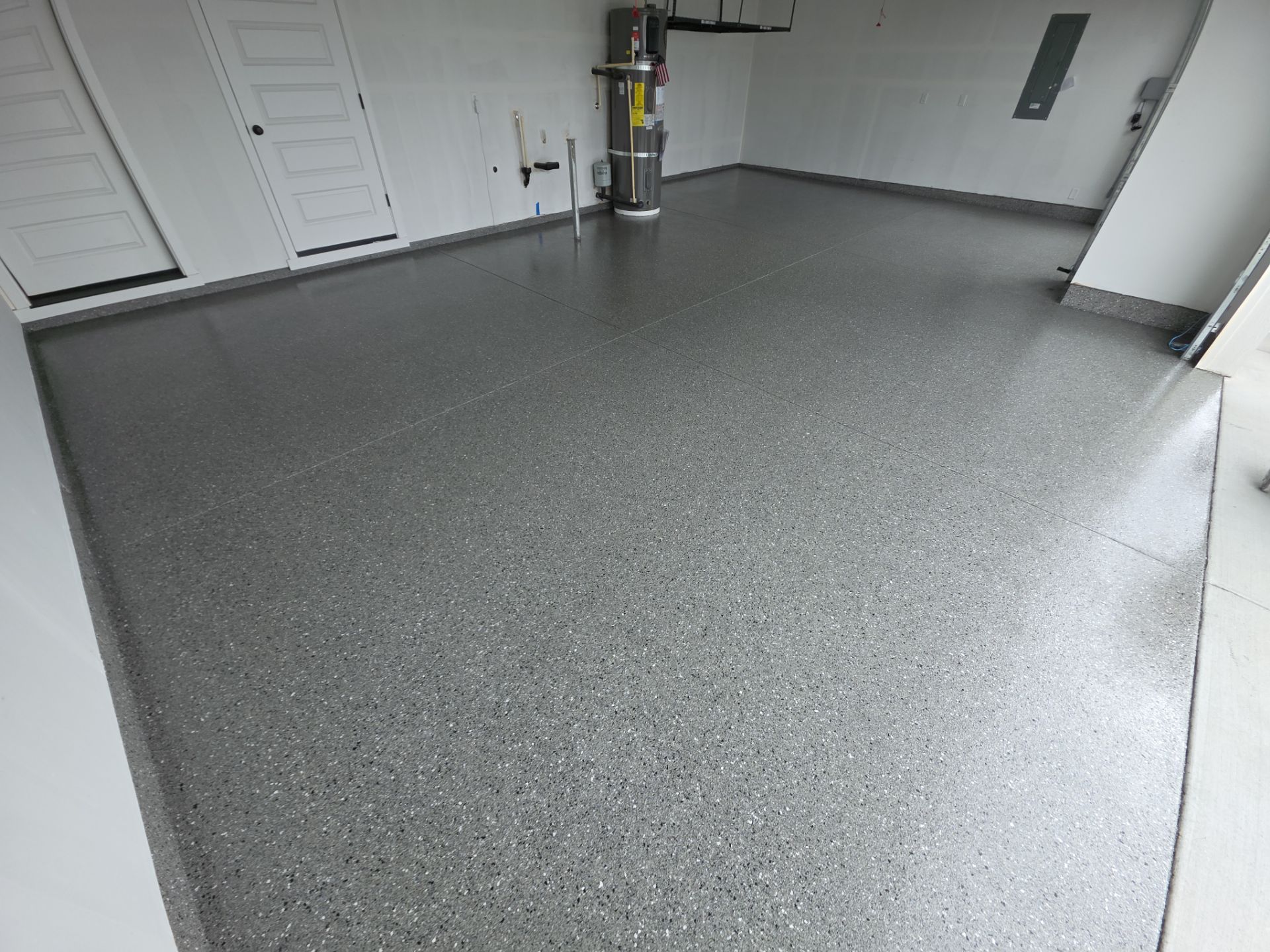 Battleship Hybrid Multi-Layer Garage Floor Coating in Cheney by Croc Coatings, LLC