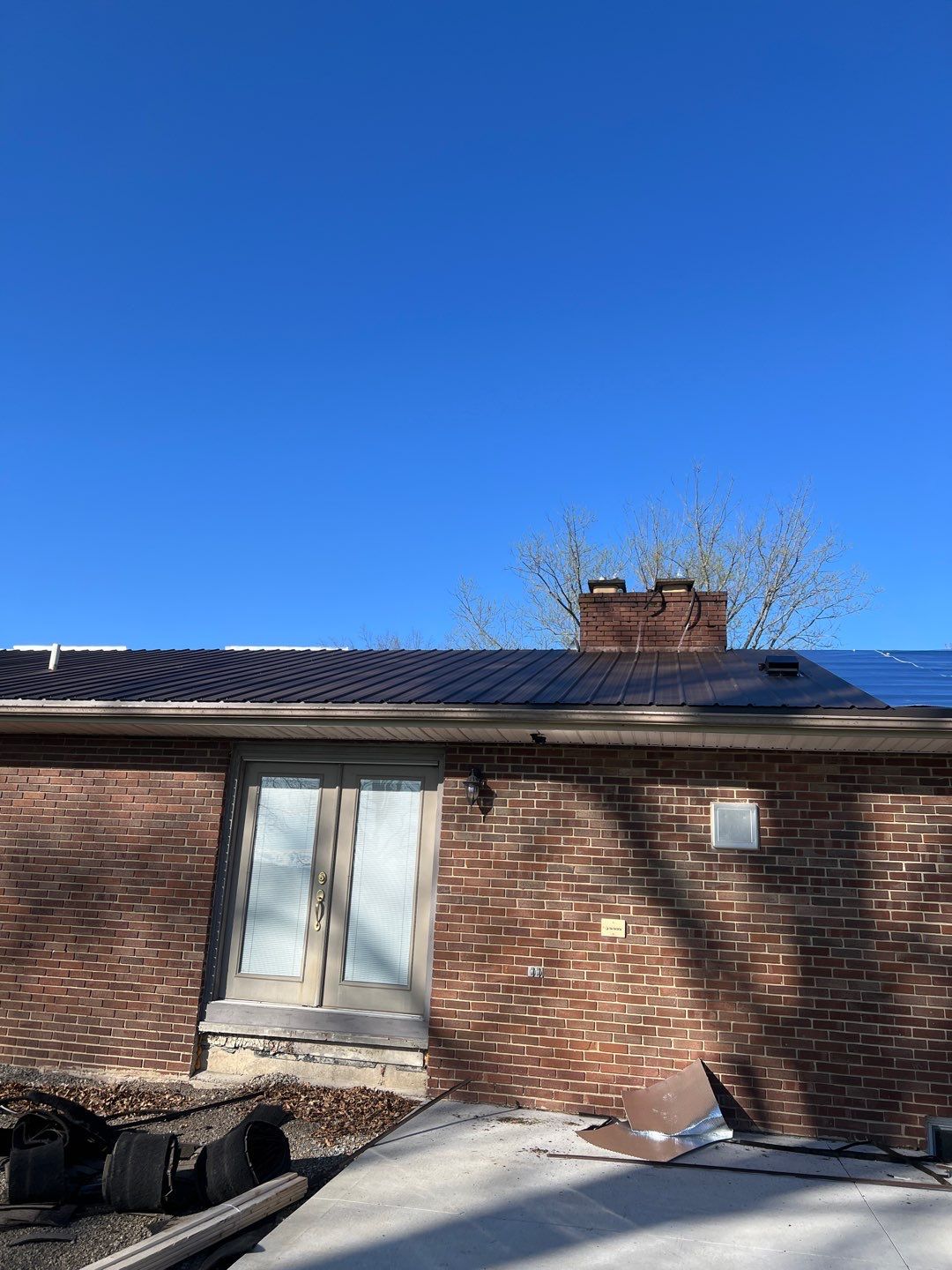 Residential Roofing Installation using Performance Panel Metal - Crinkle Bronze by RoofX 