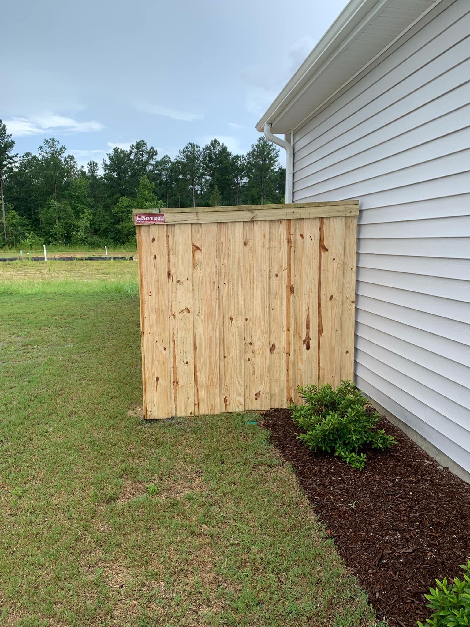 Board on Board with Top Cap by Superior Fence and Rail