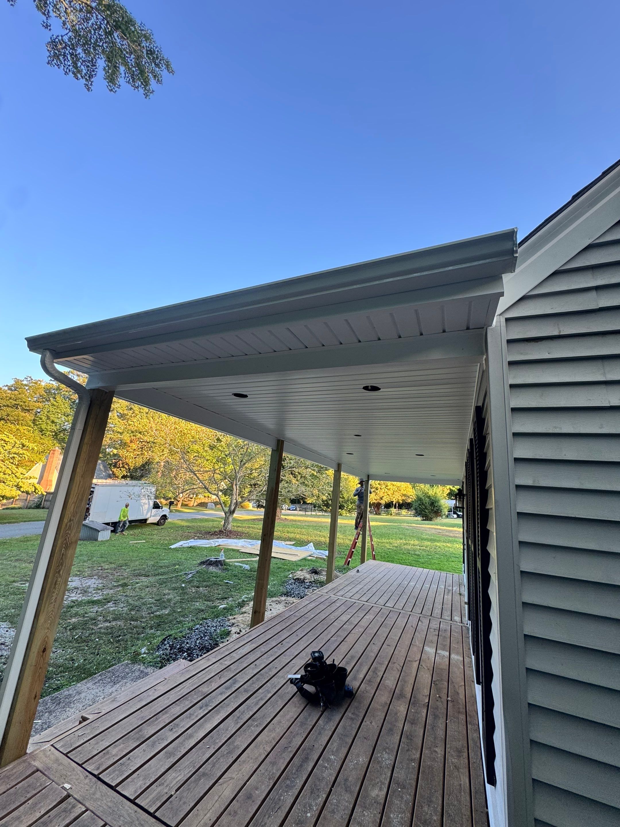 Asphalt Shingle Roof Replacement and Custom Porch Renovation in Hayes by Cade Construction
