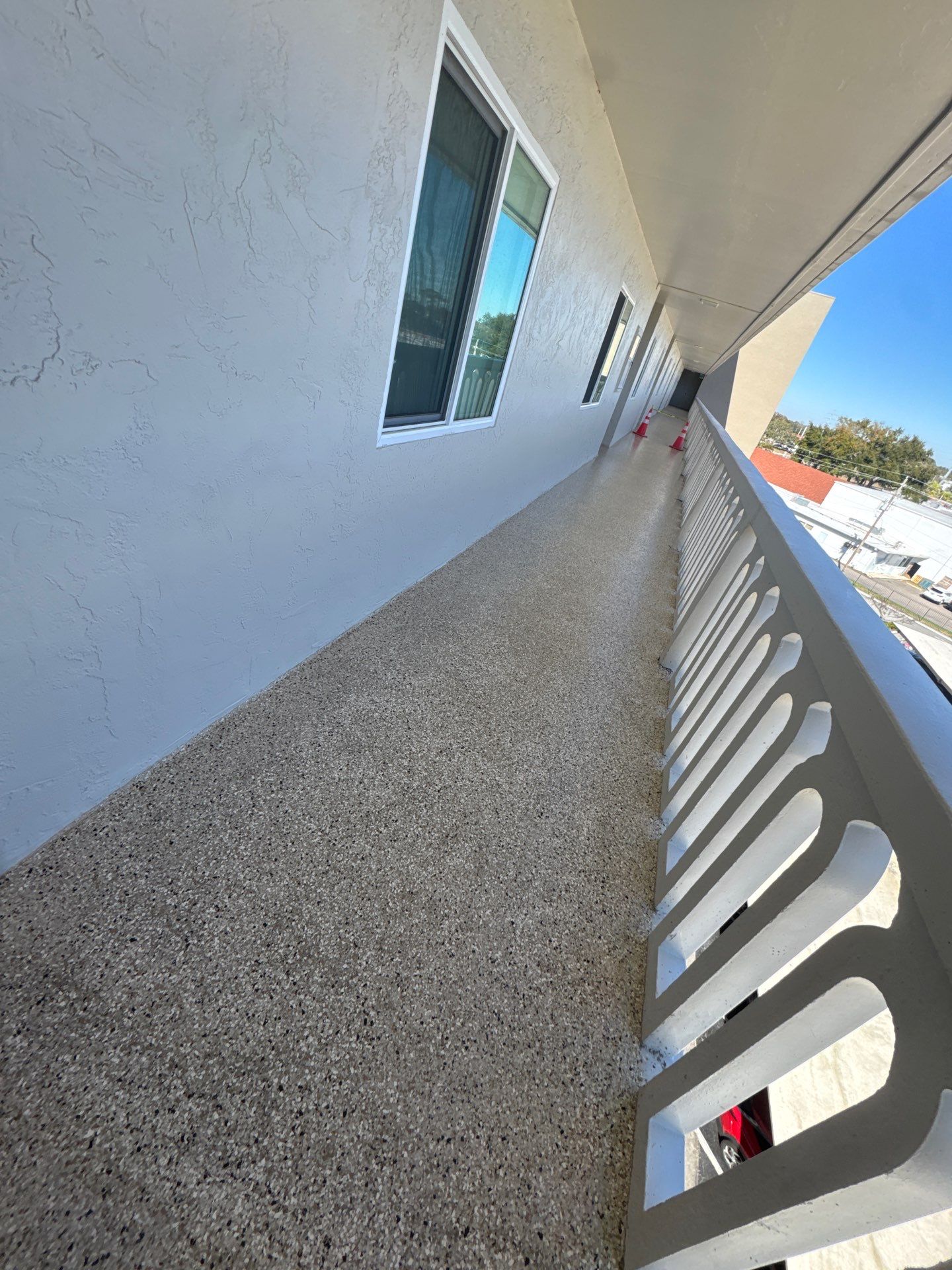 Major Condo Concrete Restoration & 'Shoreline' Flake Transformation by Performance Floors & Coating