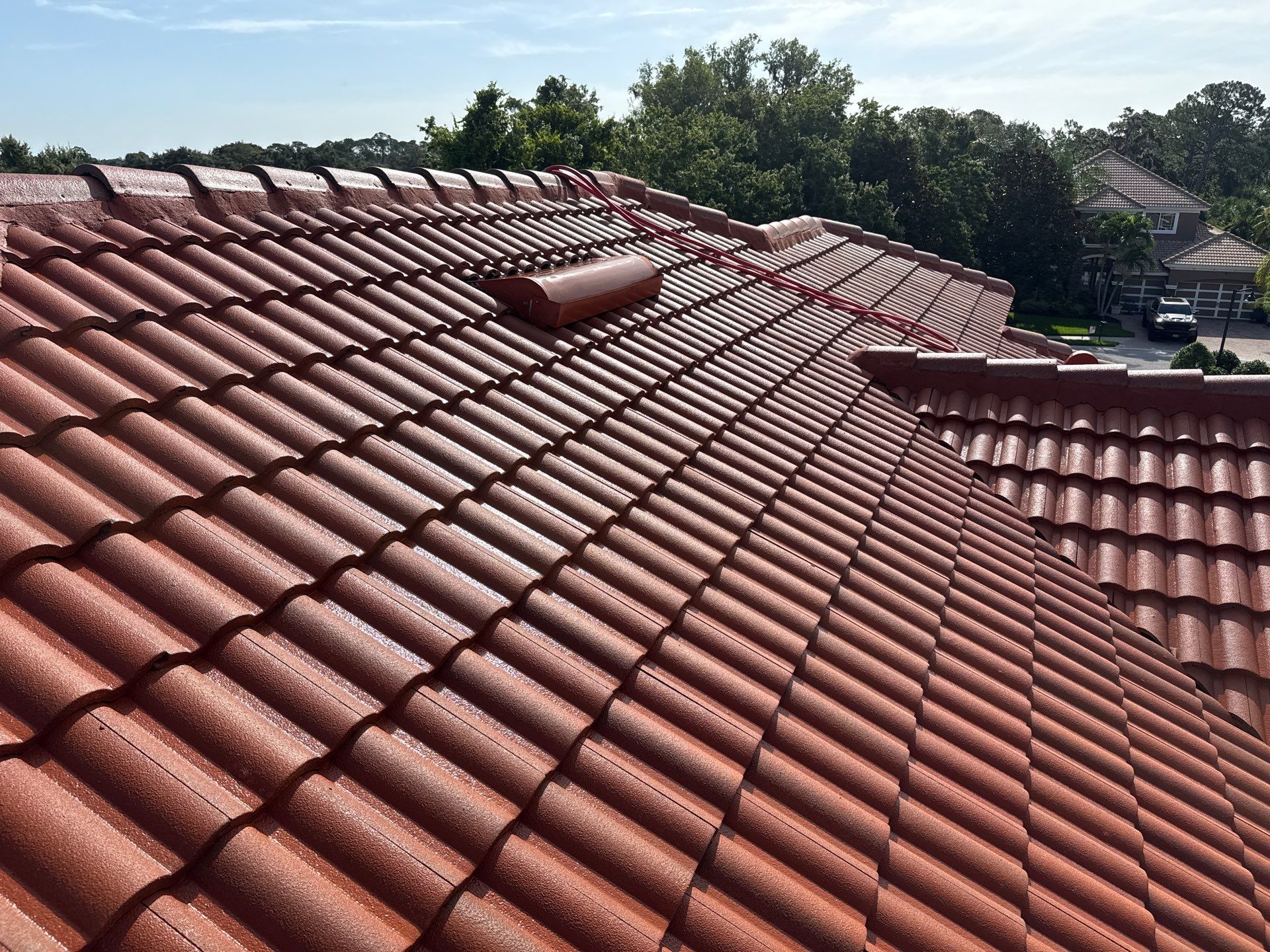 Soft Wash Tile Roof Cleaning in Sonoma Community, Sarasota, FL by Sunshine AquaWash