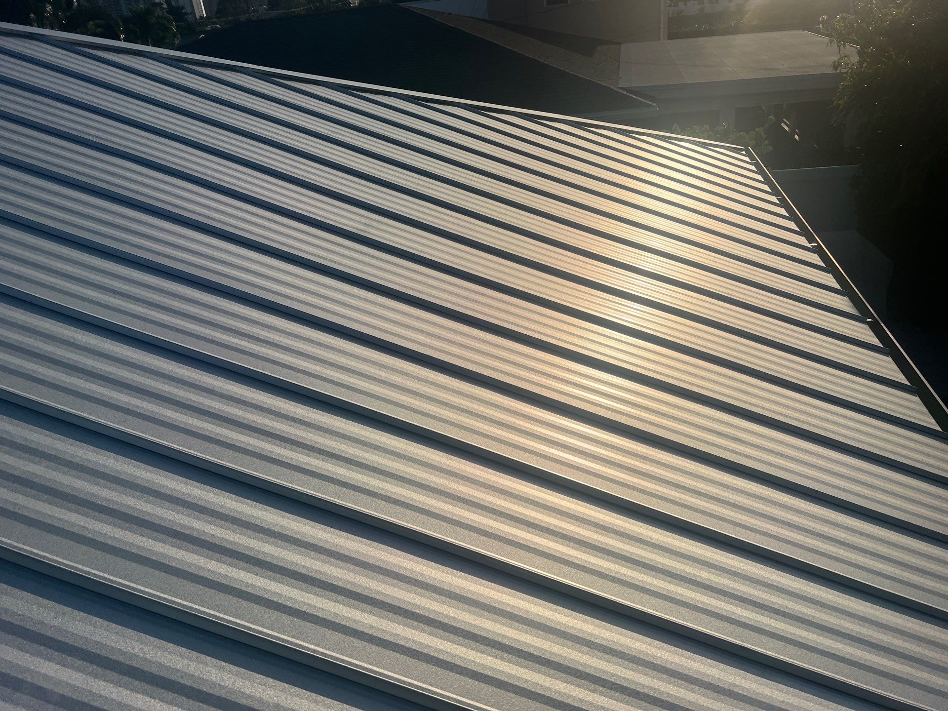 Residential Roofing Installation using Galvalume Standing Seam by Durabilis Roofing INC
