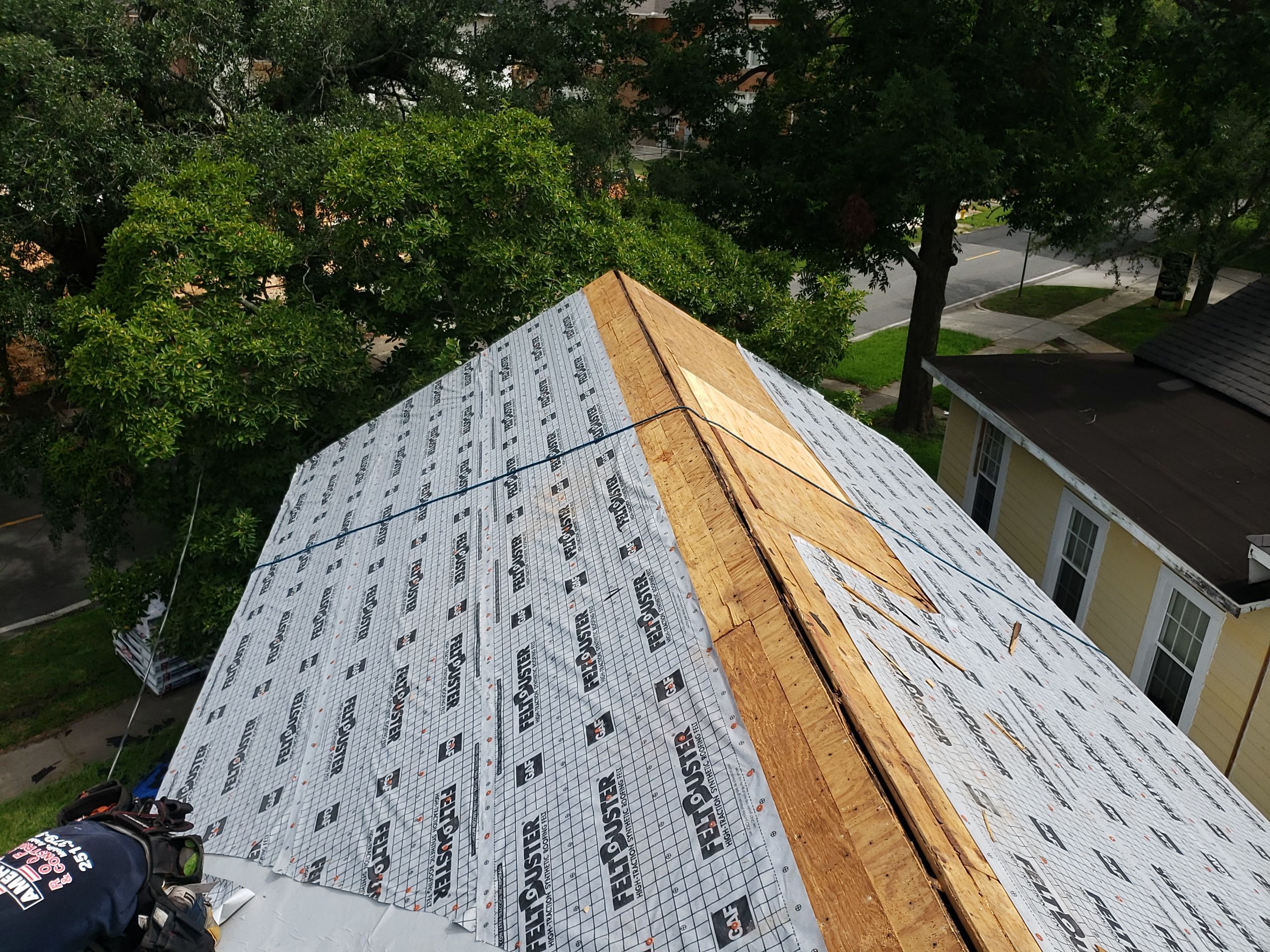 Residential Roofing Installation using Roof Replacement by American Roofing & Construction LLC