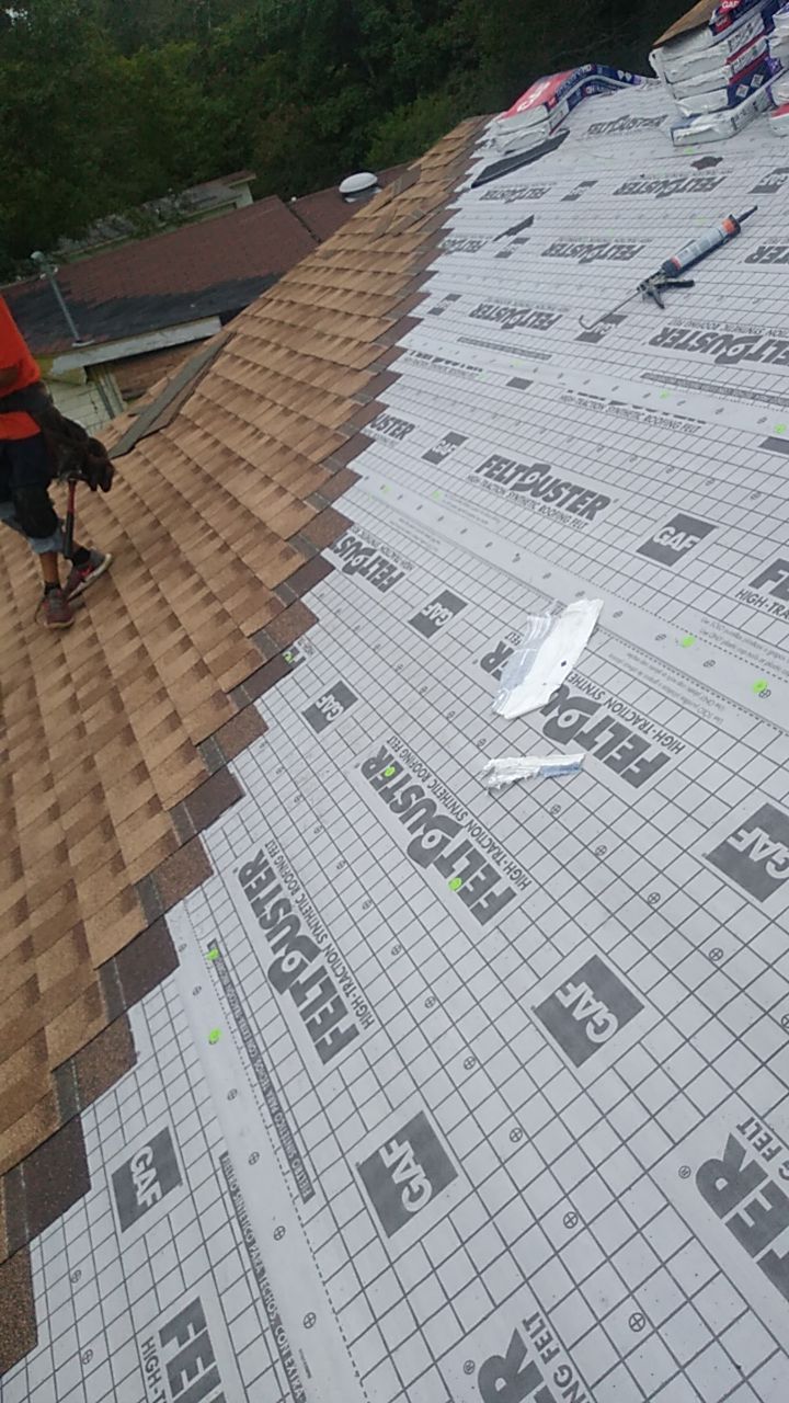 Residential Roofing Installation using Roof Replacement by American Roofing & Construction LLC