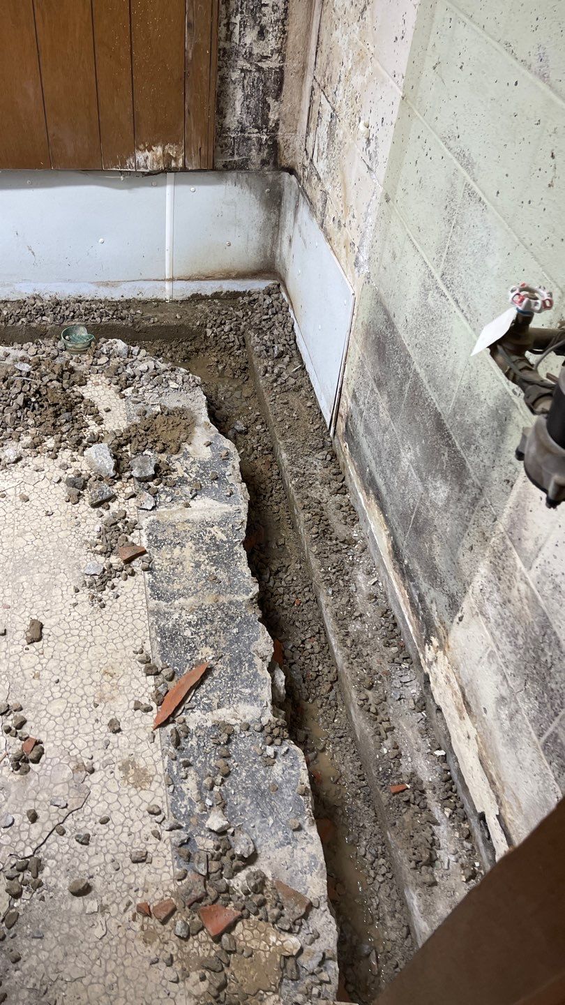 Interior Waterproofing Using GrateDrain™ Products by Toledo Basement Repair