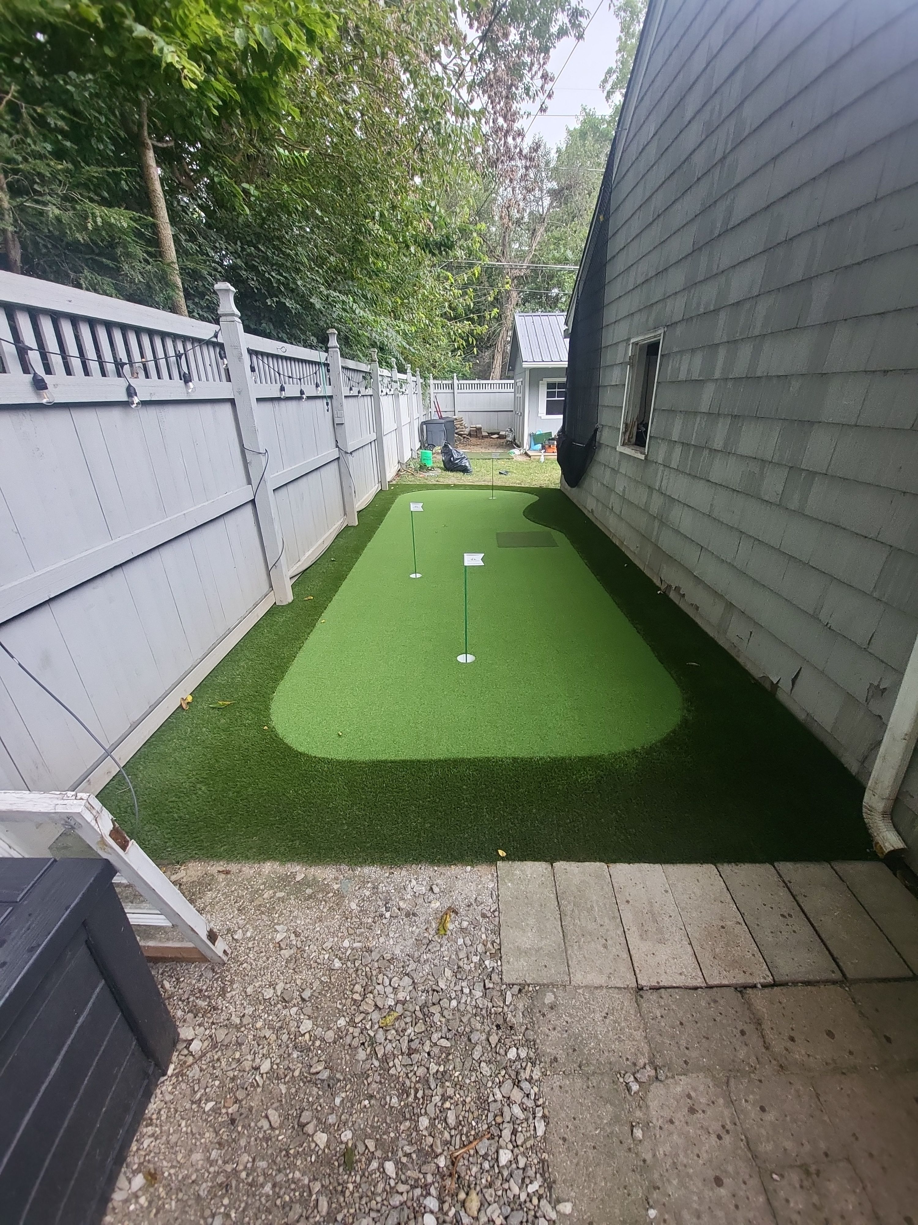 Custom Side Yard Artificial Turf Putting Green Installation in Columbus by Southwest Greens Midwest