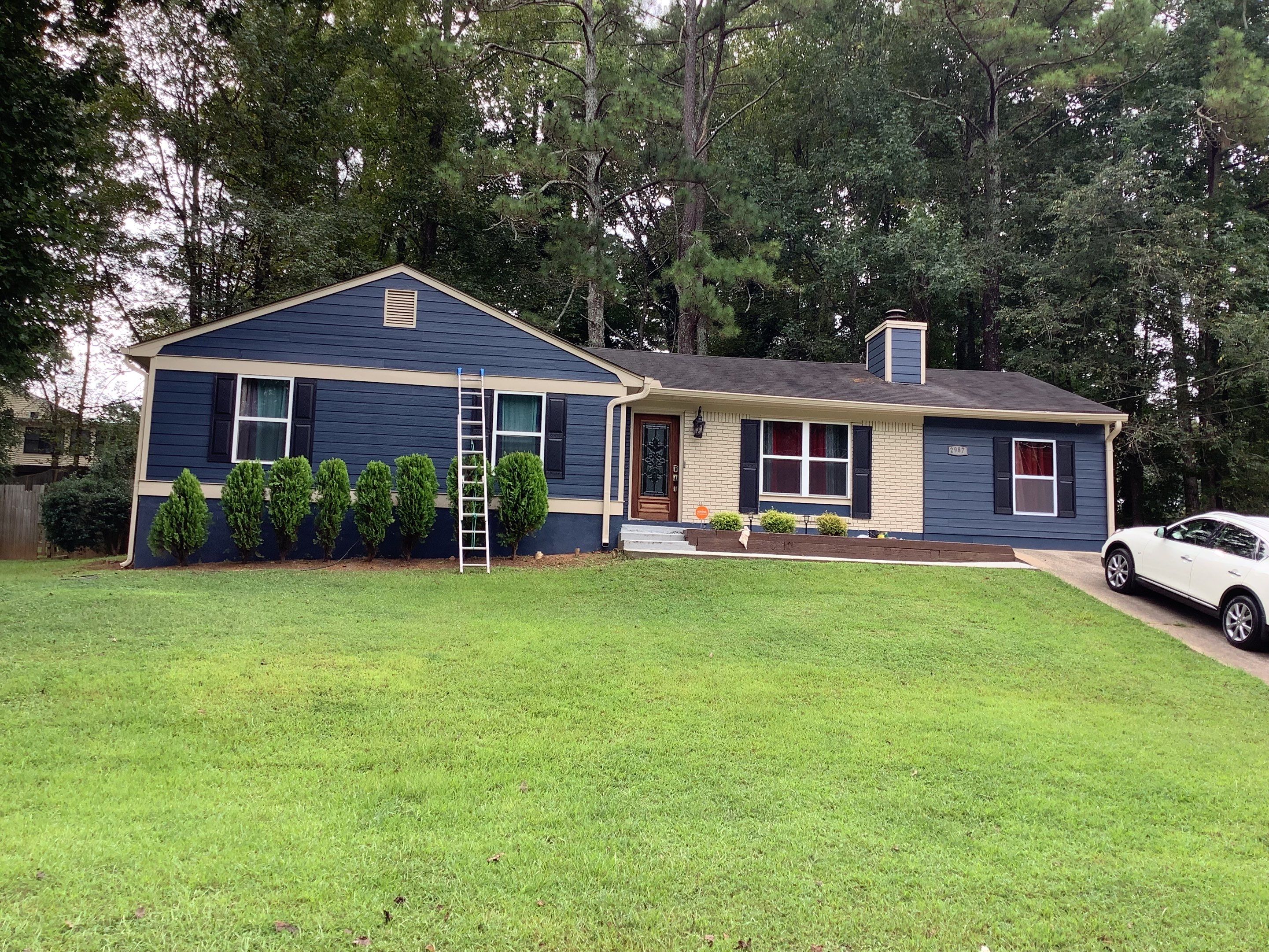 Screened Porch Construction with Vaulted Wood Ceiling in Douglasville by Swift Home Renovations