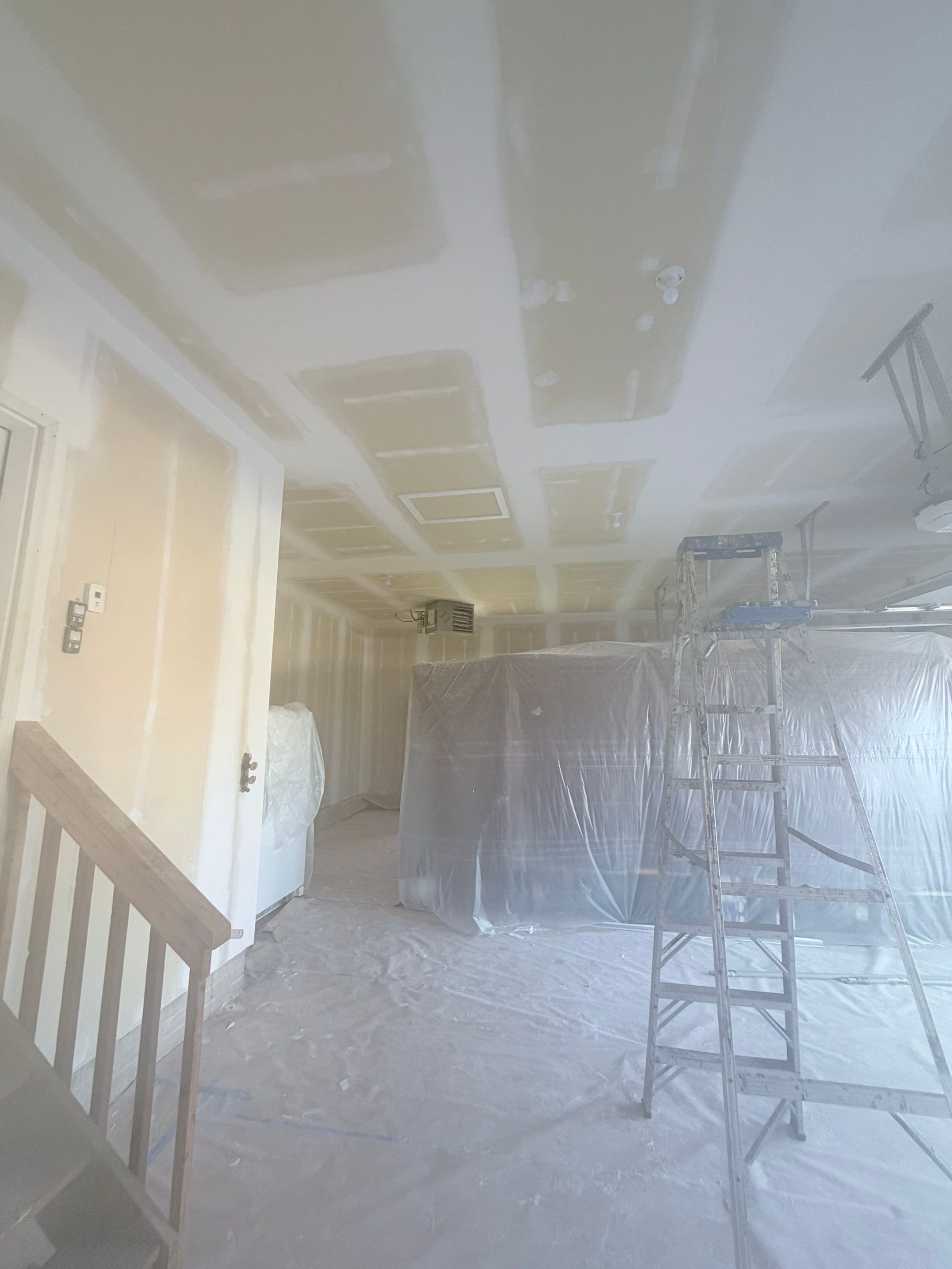Full Garage Interior Drywall Finishing and Priming in Sioux Falls by Select Painting, Coatings & Garage Cabinets
