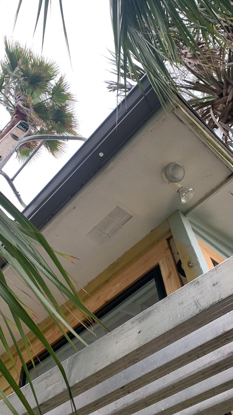 Seamless Gutter Installation using Charcoal Grey Gutters by Gutter Professors