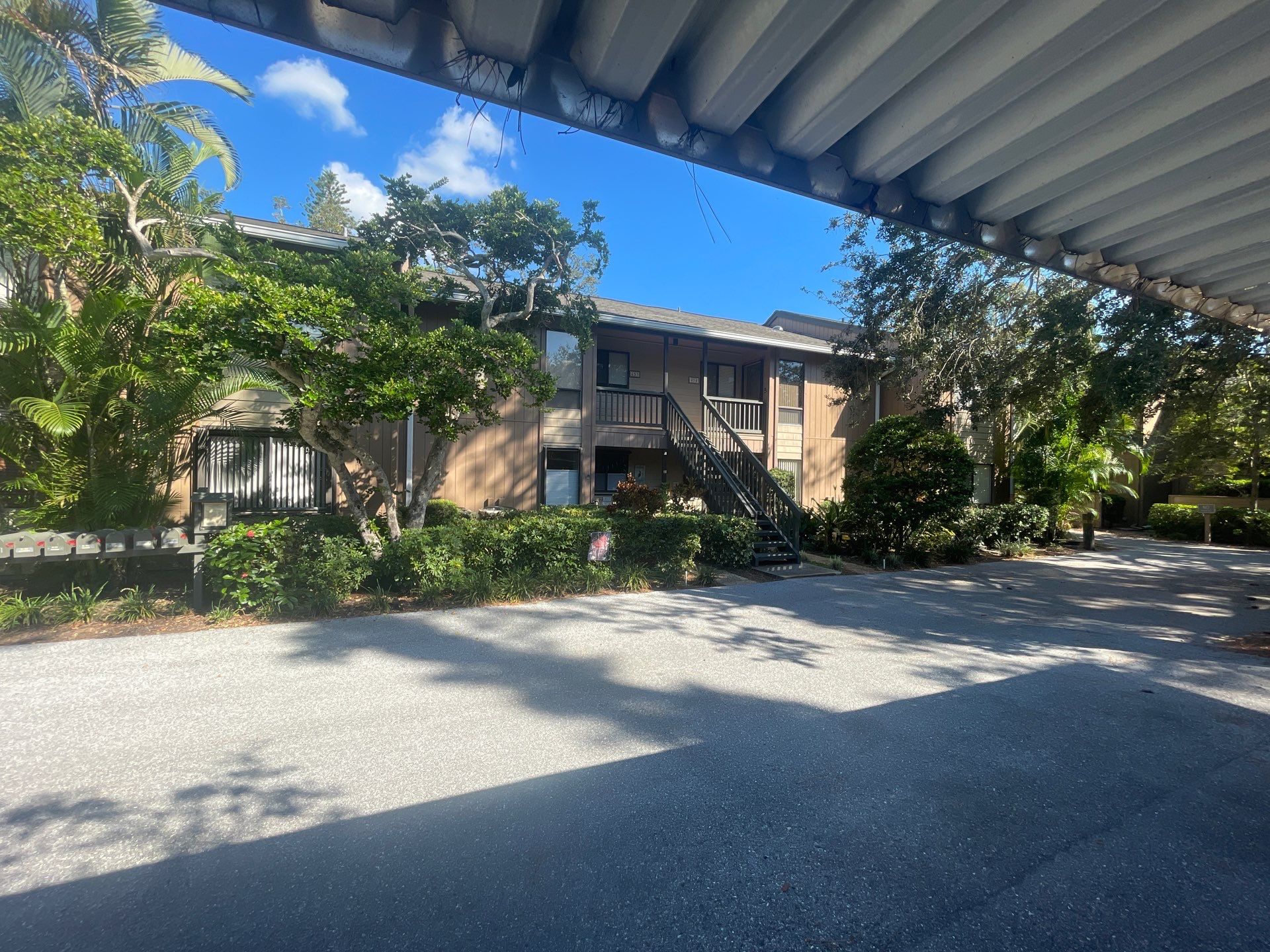 Clean Gutters and Roof in Sarasota FL by Gutter Professors