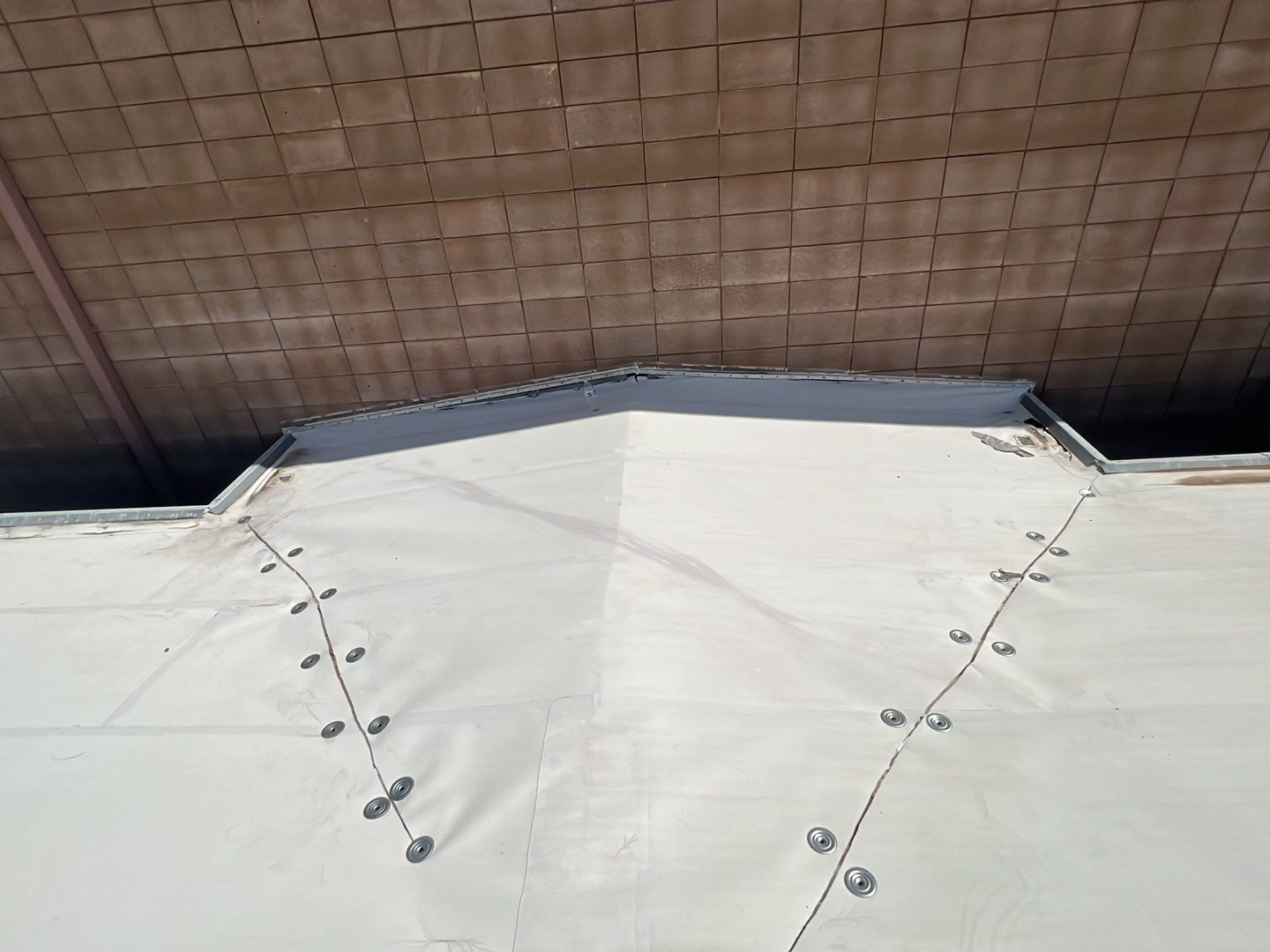 MR Roofing system using Benchmark/PUMA XL coatings over TPO single-ply roofing by Straight Edge Roofing Inc