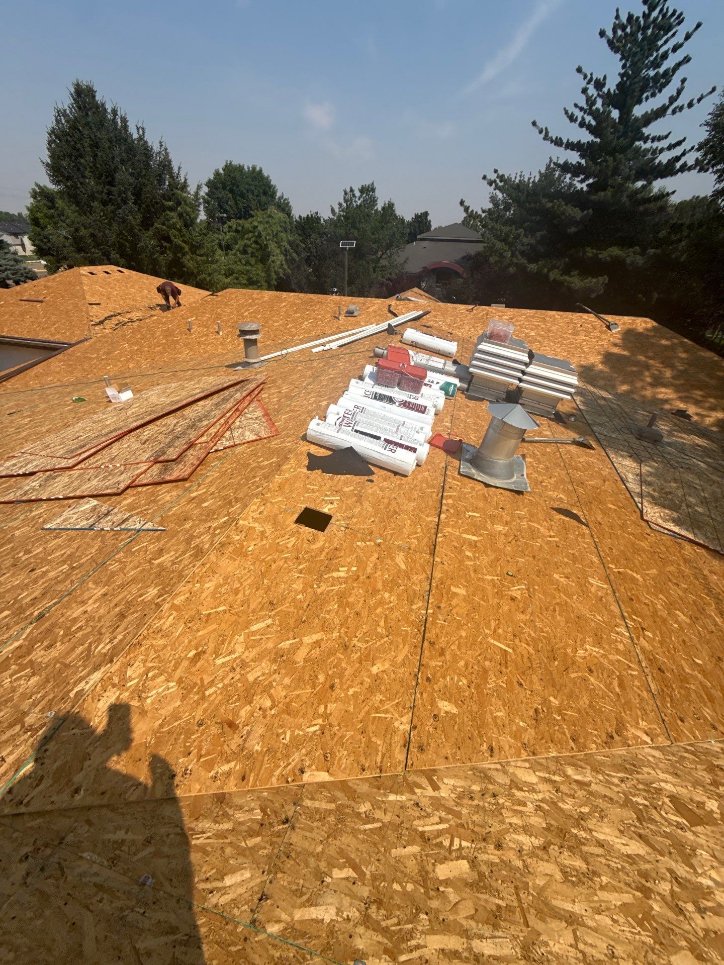 Boise Commercial Roof Replacement with Brown Architectural Shingles by Olive Roofing