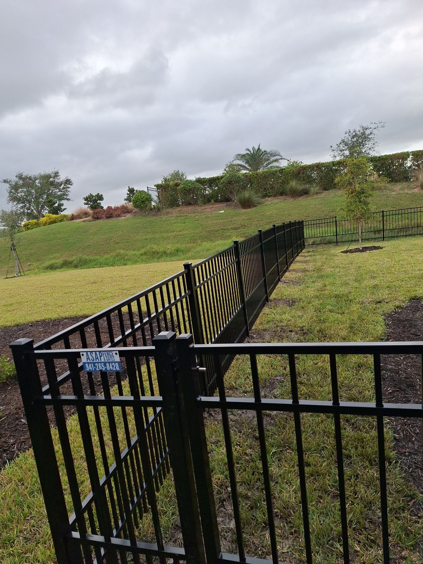 Aluminum Fence Installation using 4ft 3 Rail Black Aluminum Fence by Asap fence and gates, LLC