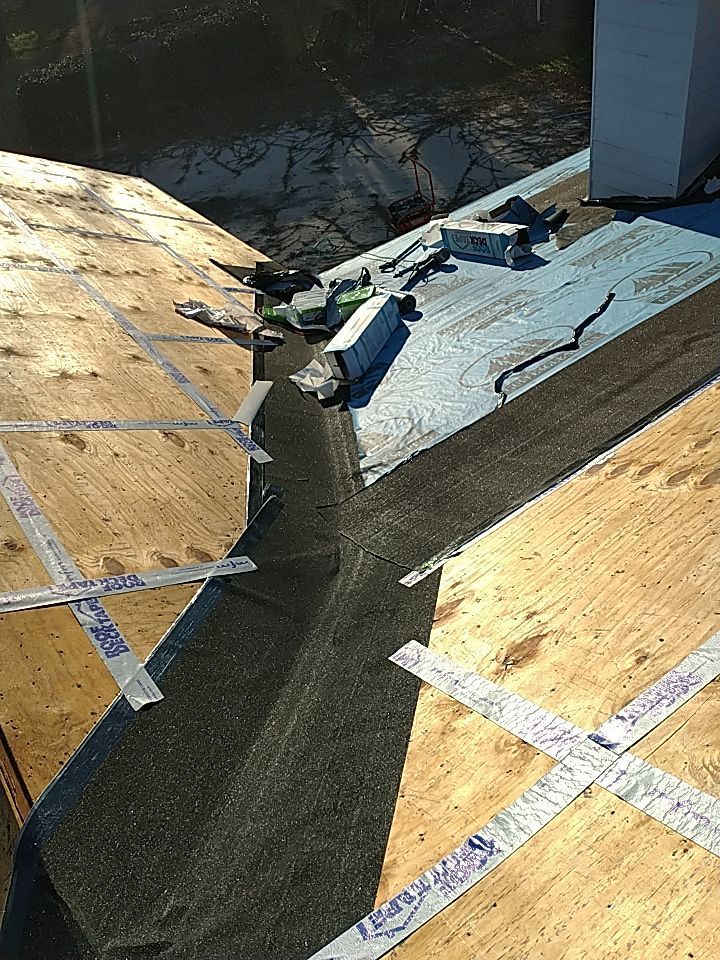 Residential Roofing Installation using Roof Replacement by American Roofing & Construction LLC