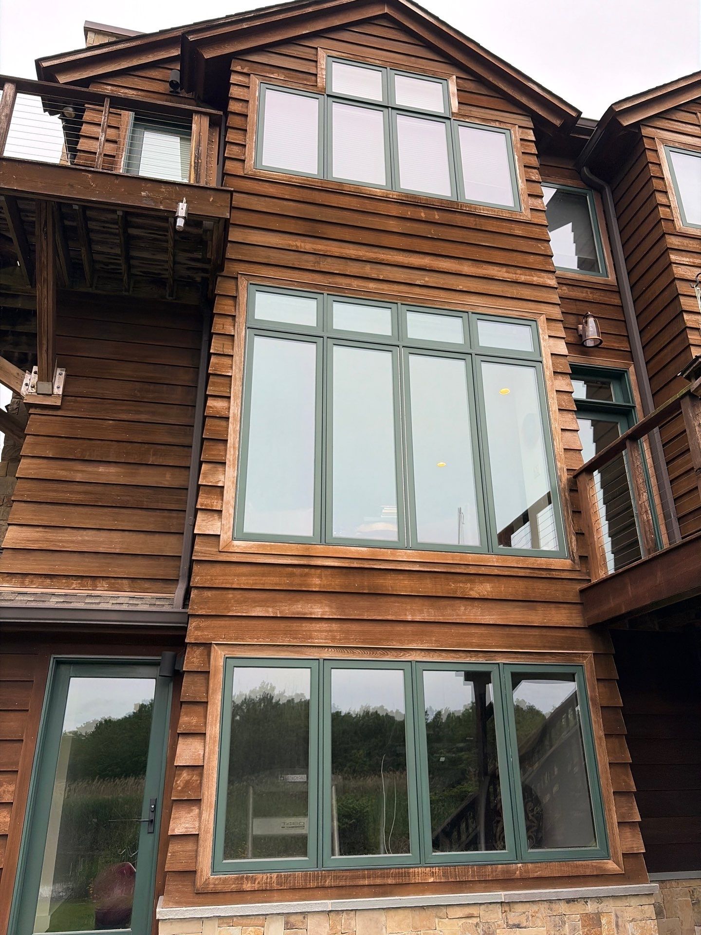 Exterior Powerwashing and Maintenance for a Teaneck Timber Home by Spectrum Painting, LLC