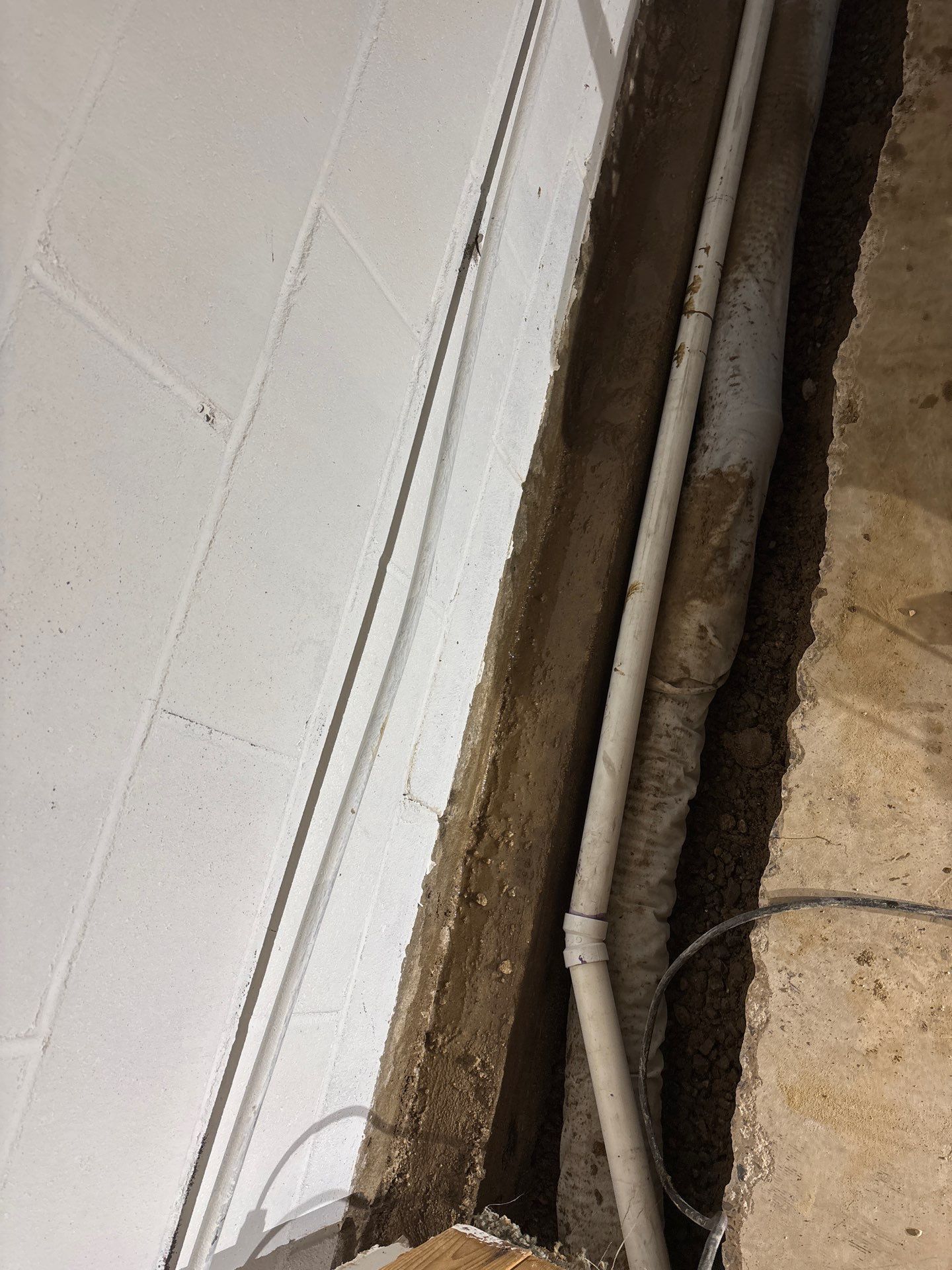 Interior Drain Tile & Foundation Crack Repair in St. Anthony, MN by Waterproofing Northeast