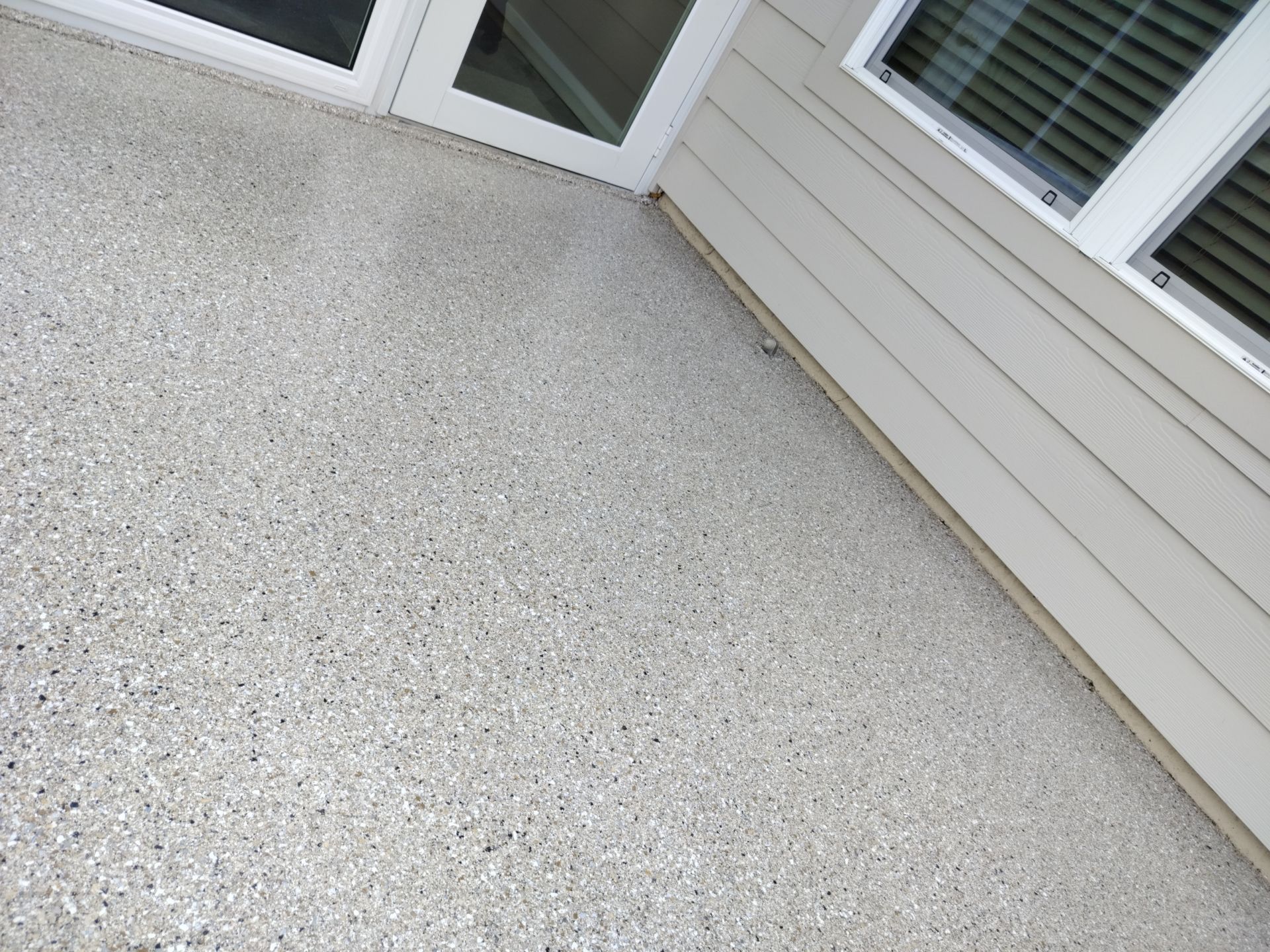 Patio with Claystone  by Innovative Concrete Coatings 