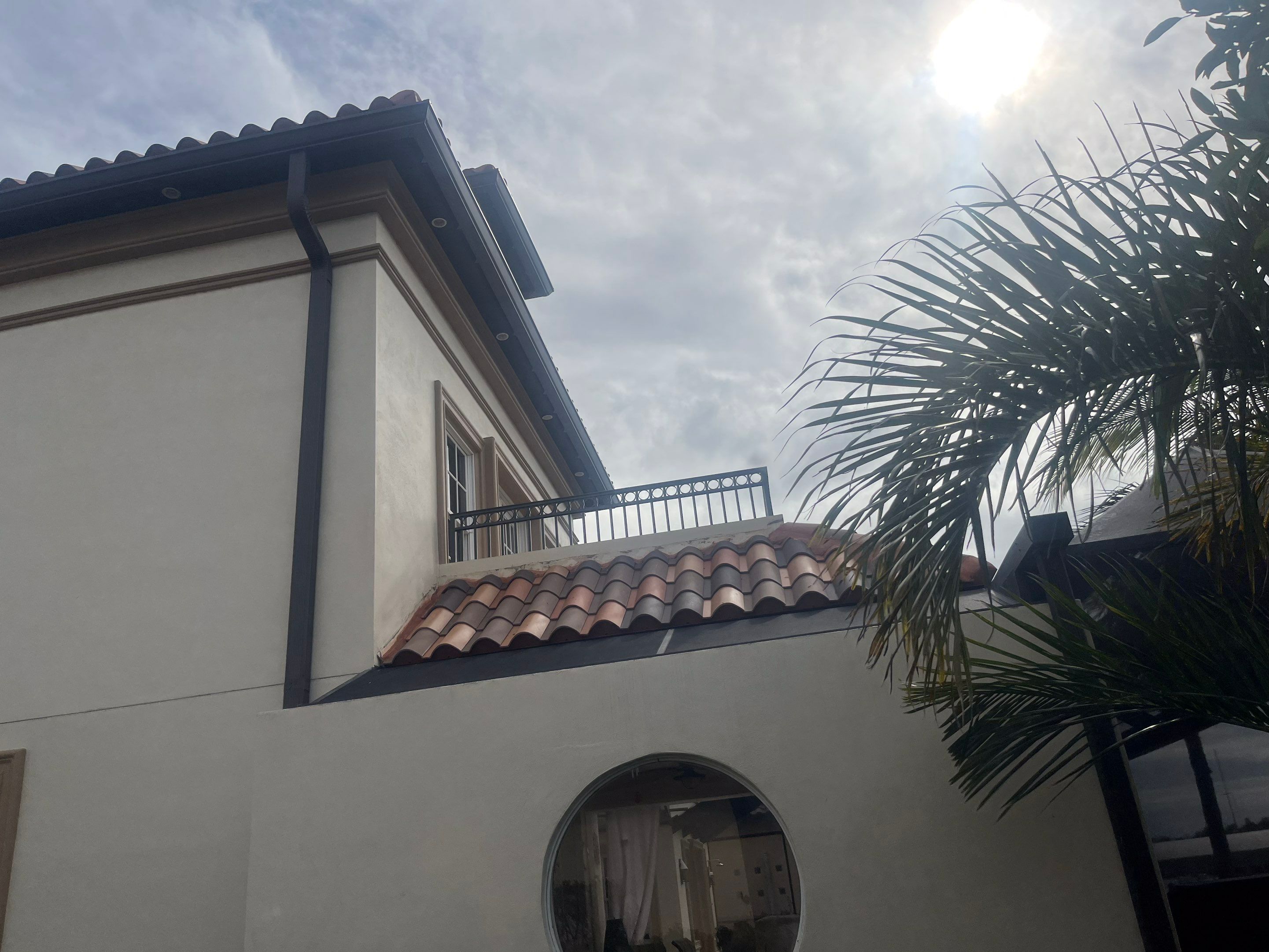 Musket Brown Seamless Gutters using Musket Brown Seamless Gutters in Cape Coral FL by Gutter Professors